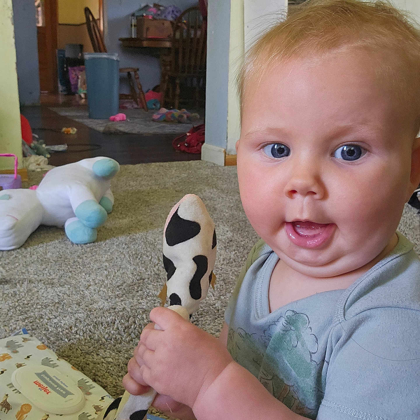 Ryleigh joined the competition — help win amazing prizes! architecture, baby, bodypart, building, chair, clothing, couch, face, finger, furniture, hand, head, indoors, livingroom, person, photography, portrait, room, toy, wood