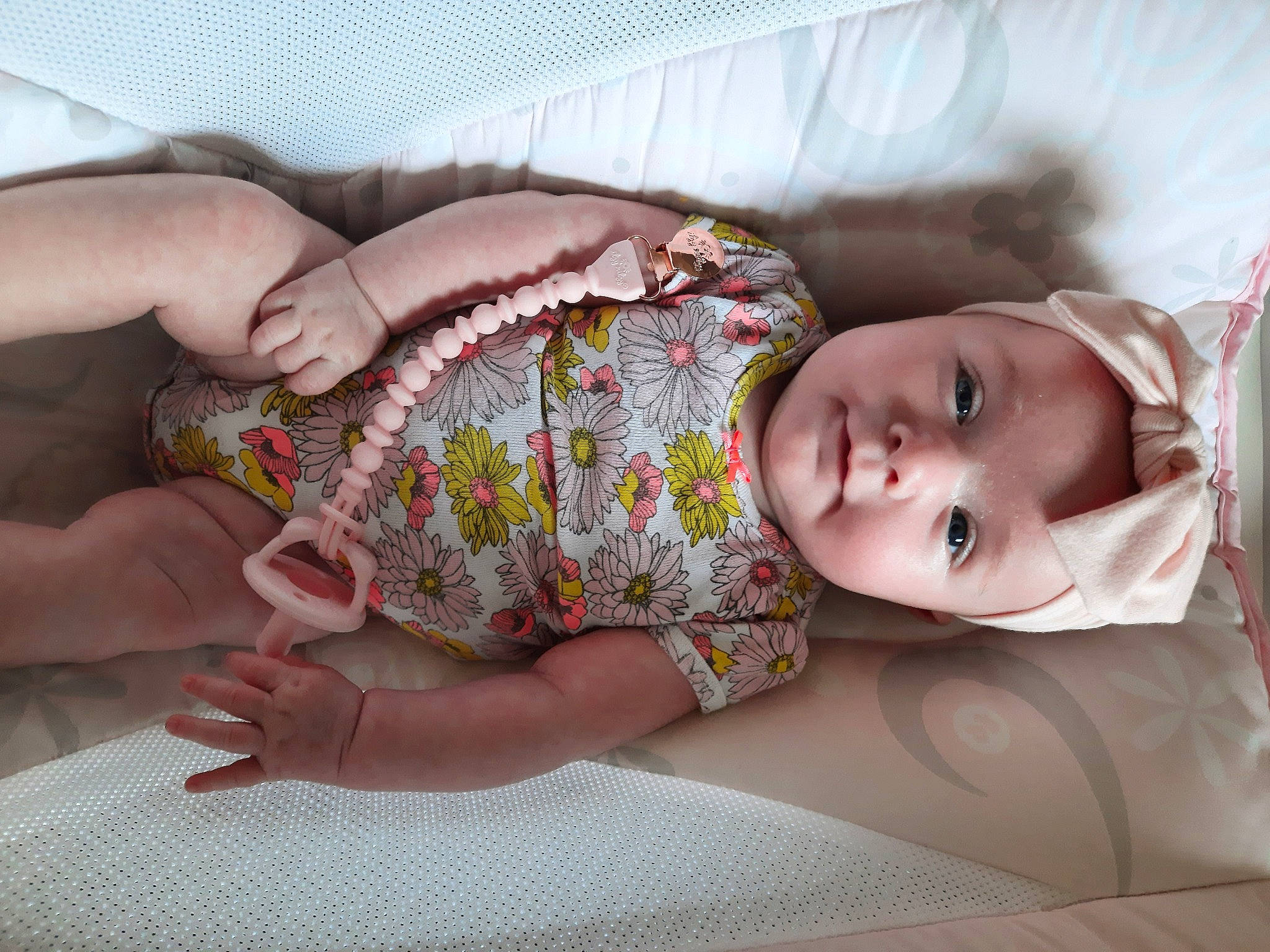 Olivia is registered to the contest to win money with this photo: arm, baby, baby_sleeping, baby_toddler_clothing, comfort, eye, finger, glasses, hand, headgear, headwear, human_body, leg, linens, mammal, mouth, neck, person, skin, sleeve