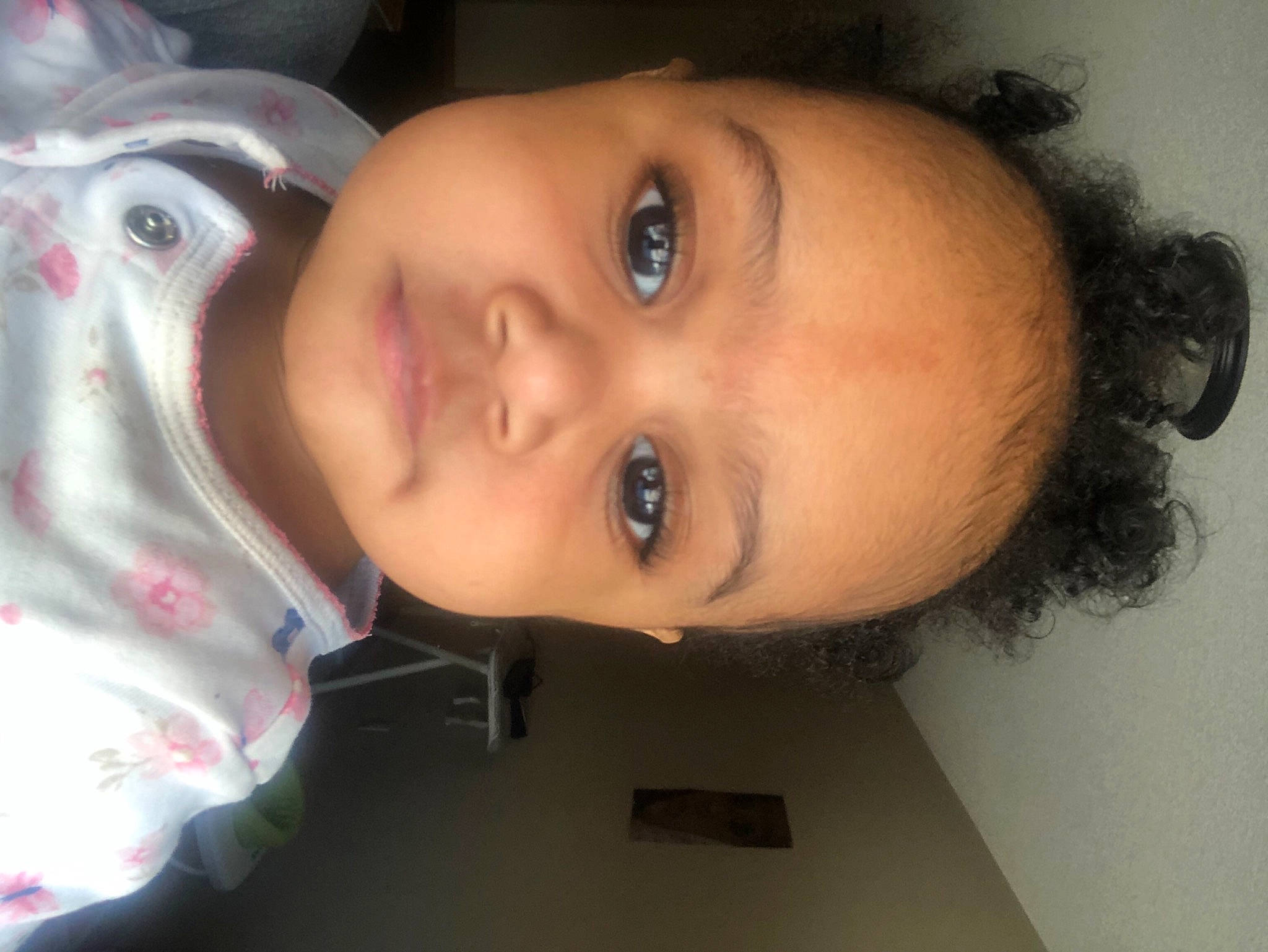 Avaya is registered to the contest to win money with this photo: baby, black_hair, cheek, chin, ear, eye, eyebrow, eyelash, forehead, fun, human_body, iris, jaw, lip, mouth, neck, nose, person, skin, smile