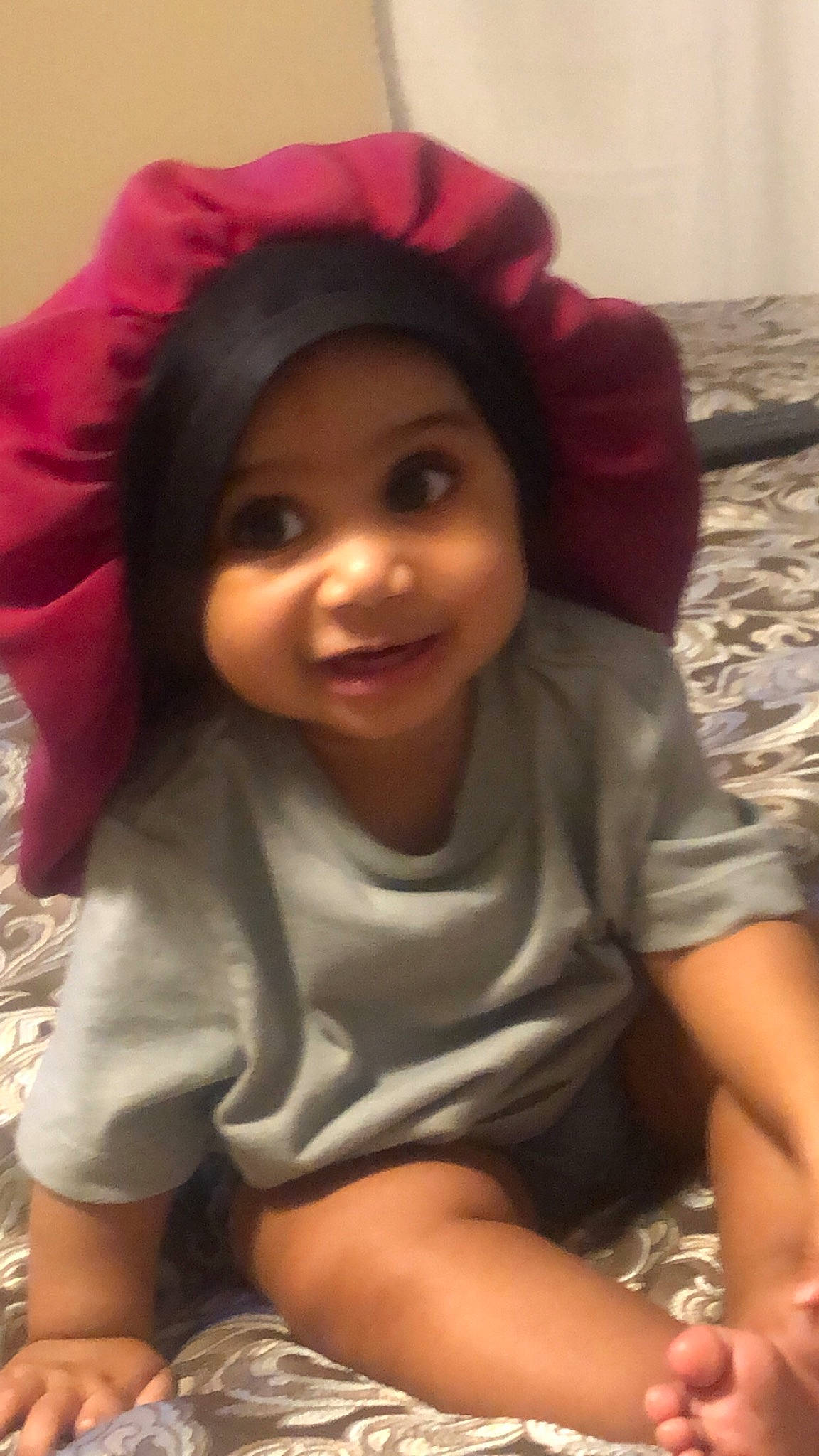 Avaya is registered to the contest to win money with this photo: black_hair, cap, cheek, clothing, cool, eye, eyebrow, facial_expression, forehead, hair, happy, head, headwear, iris, joy, lip, mouth, nose, person, pink