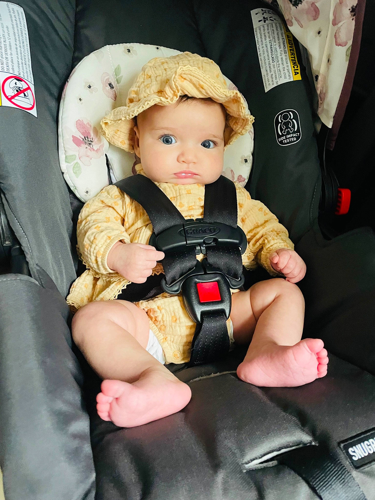 Adaline joined the competition — help win amazing prizes! baby, baby_carriage, baby_products, baby_toddler_clothing, bag, car_seat, car_seat_cover, child, comfort, doll, hat, human_leg, lap, person, pink, seat_belt, sitting, stuffed_toy, thigh, toddler