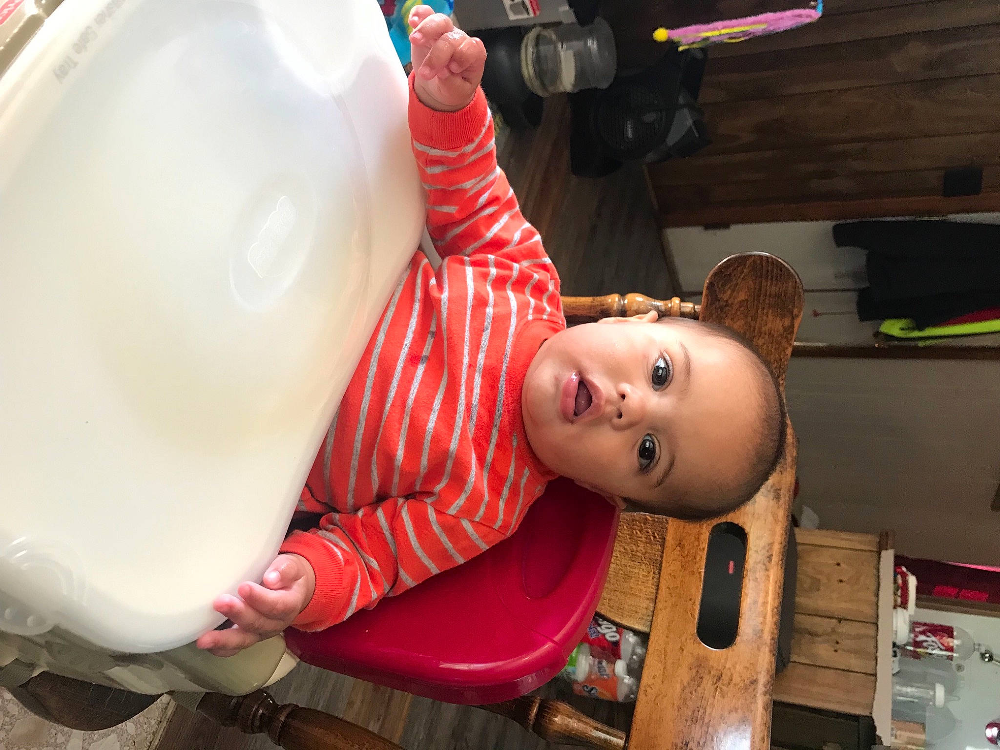 Zander is registered to the contest to win money with this photo: audio_equipment, baby, child, fun, gas, hat, kitchen, machine, person, plastic, room, shelf, smile, toddler, wood