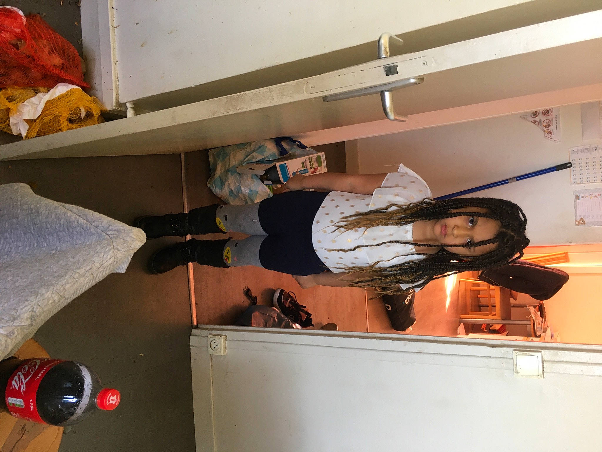 Leïla participe au concours pour gagner de l'argent avec cette photo : ceiling, comfort, elbow, flooring, fun, hat, interior_design, knee, machine, person, plaster, room, shelf, space, t_shirt, wall, wood