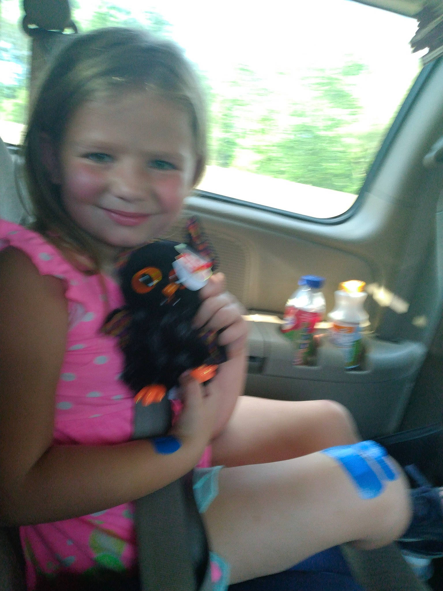 Aubrie joined the competition — help win amazing prizes! black_hair, child, finger, fun, gesture, hand, happy, head_restraint, iris, joy, long_hair, mouth, nail, person, skin, smile, steering_wheel, thumb, toddler, toy