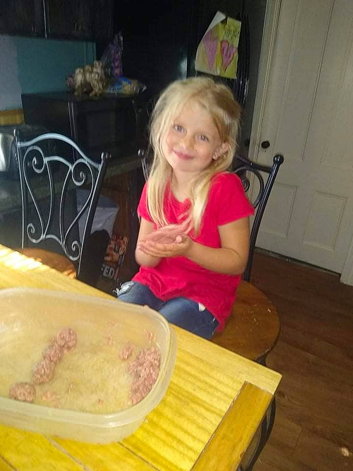 Autumn is registered to the contest to win money with this photo: chair, child, cooking, door, flooring, fun, hardwood, ingredient, joy, pattern, person, plank, plywood, sitting, smile, t_shirt, tableware, toddler, varnish, wood