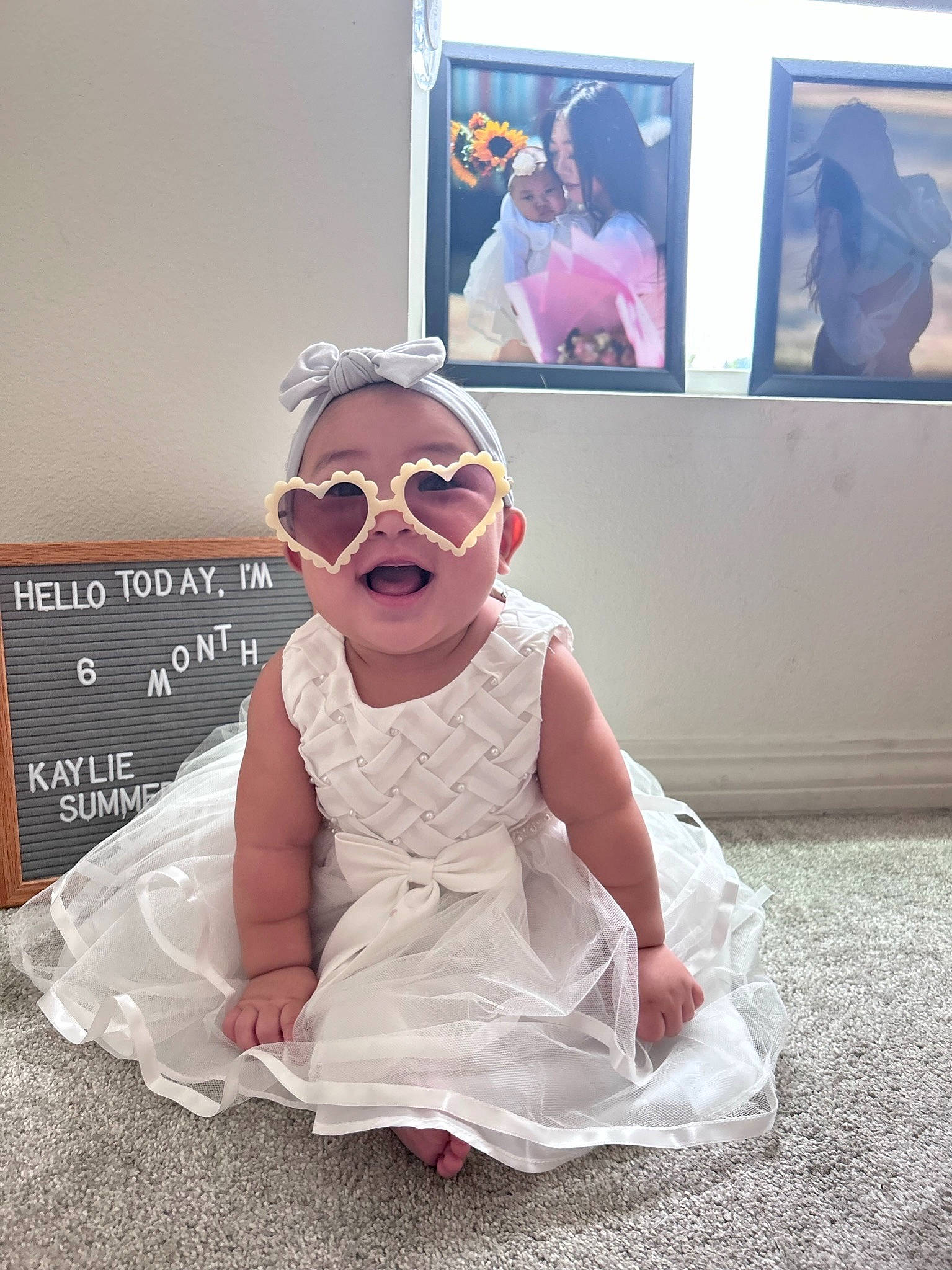 Kaylie joined the competition — help win amazing prizes! art, child, costume, event, eyewear, flooring, fun, goggles, happy, headwear, magenta, peach, person, pink, room, sitting, smile, stock_photography, sunglasses, toddler
