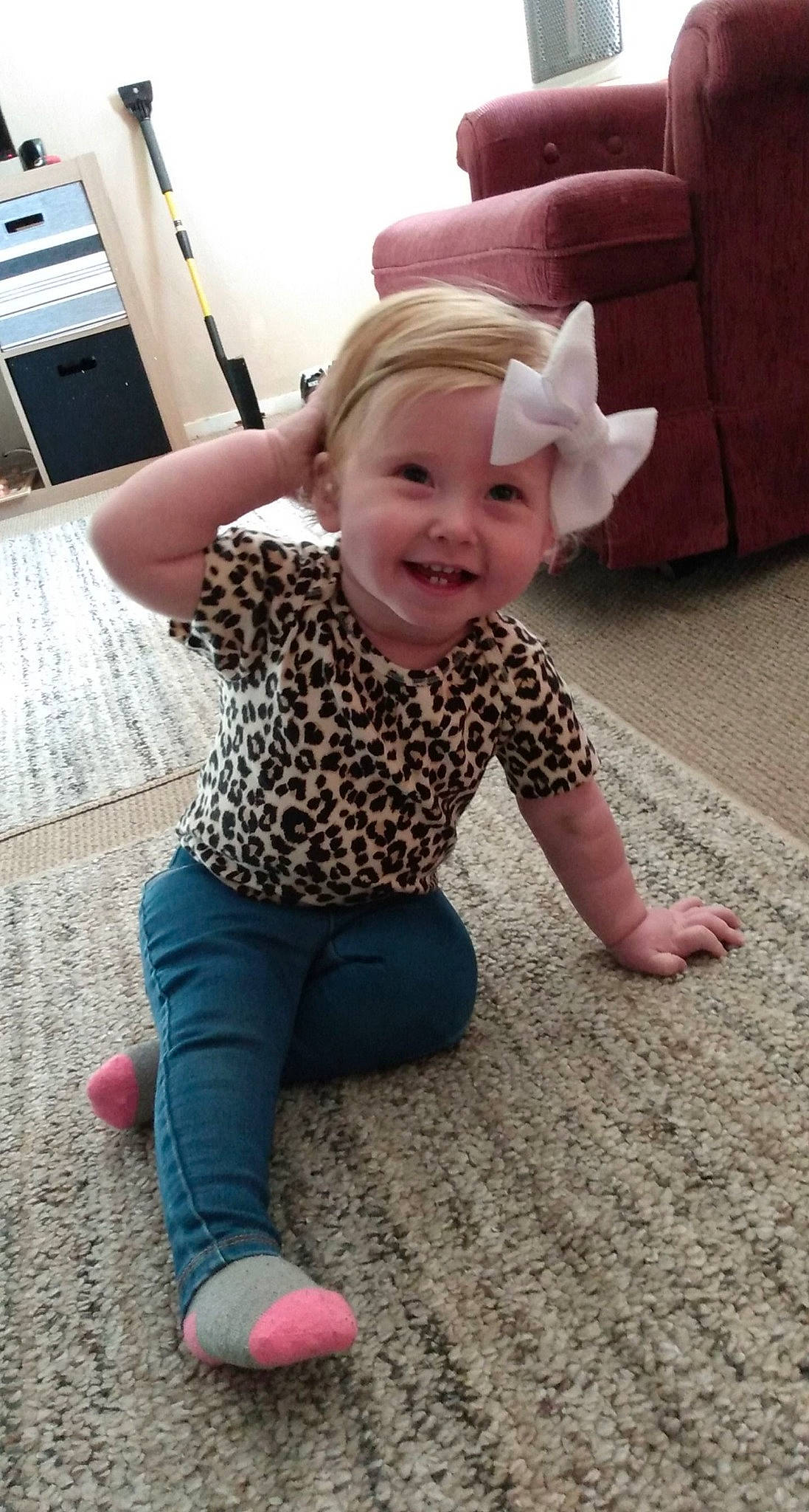 Avalynn joined the competition — help win amazing prizes! baby, baby_toddler_clothing, child, floor, flooring, fun, happy, joy, leisure, magenta, pattern, person, pink, play, product, sitting, skin, sleeve, smile, t_shirt