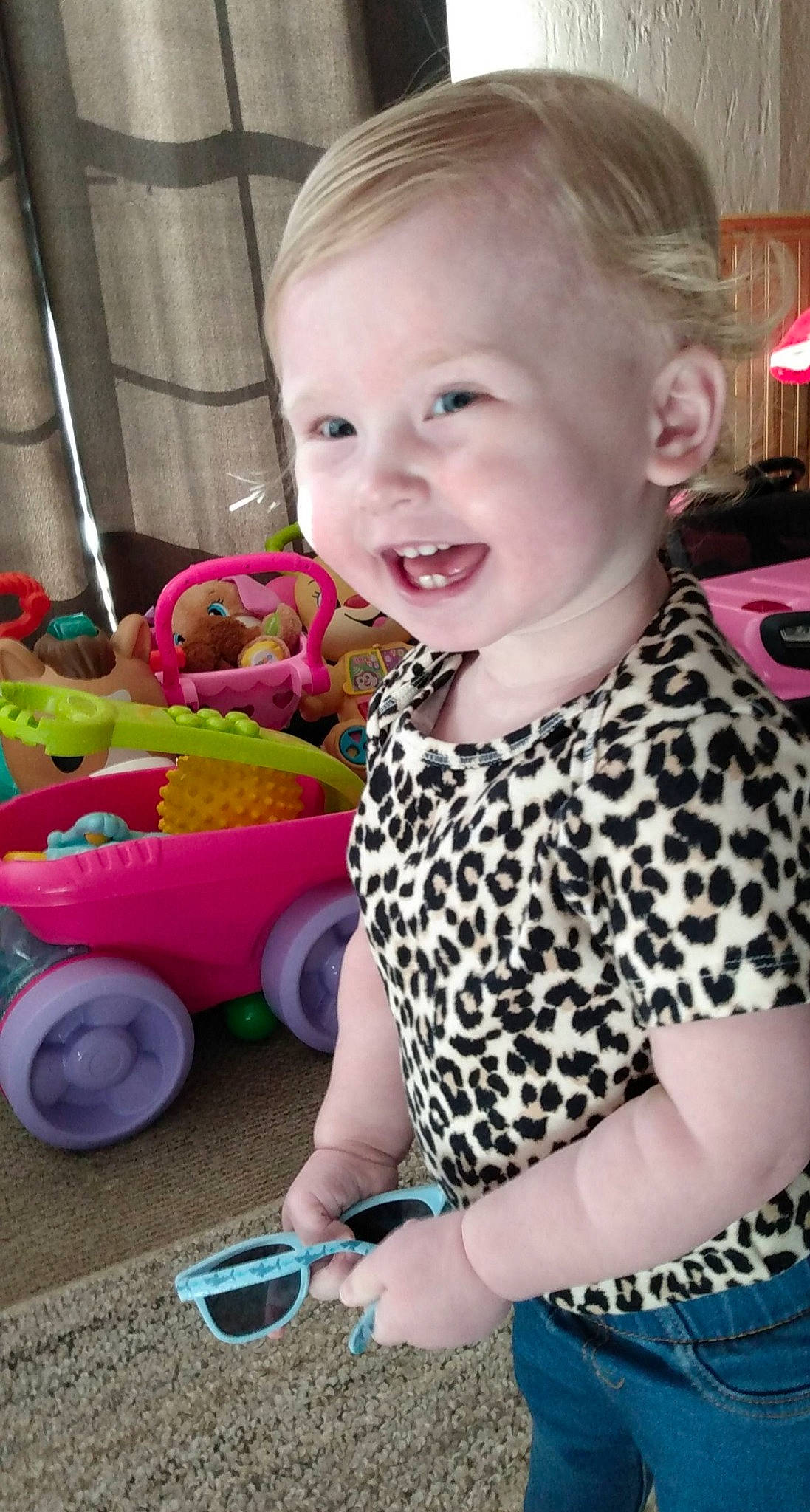 Avalynn joined the competition — help win amazing prizes! automotive_tire, baby, baby_toddler_clothing, child, dress, eye, facial_expression, fun, hairstyle, happy, iris, magenta, person, pink, skin, sleeve, smile, t_shirt, tire, toddler