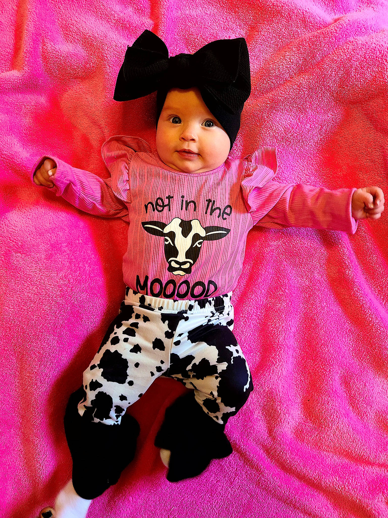 Harlee is registered to the contest to win money with this photo: baby, baby_toddler_clothing, doll, eye, fedora, font, happy, hat, magenta, pattern, person, pink, product, sleeve, stuffed_toy, sun_hat, t_shirt, textile, thigh, toddler