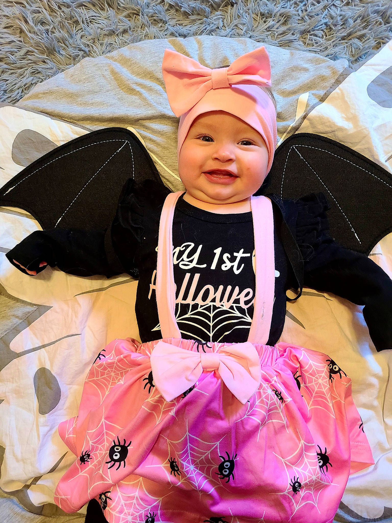 Harlee is registered to the contest to win money with this photo: baby, baby_products, baby_toddler_clothing, bag, beanie, child, costume, event, fashion_accessory, fun, happy, headwear, joy, luggage_and_bags, magenta, peach, person, pink, room, smile