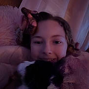 Julia joined the competition — help win amazing prizes! animal, blanket, child, comfort, cozy, curtains, dog, face, friendship, fur, hair_curlers, home, indoors, pet, plush, portrait, relaxation, smile, snuggle, young_person