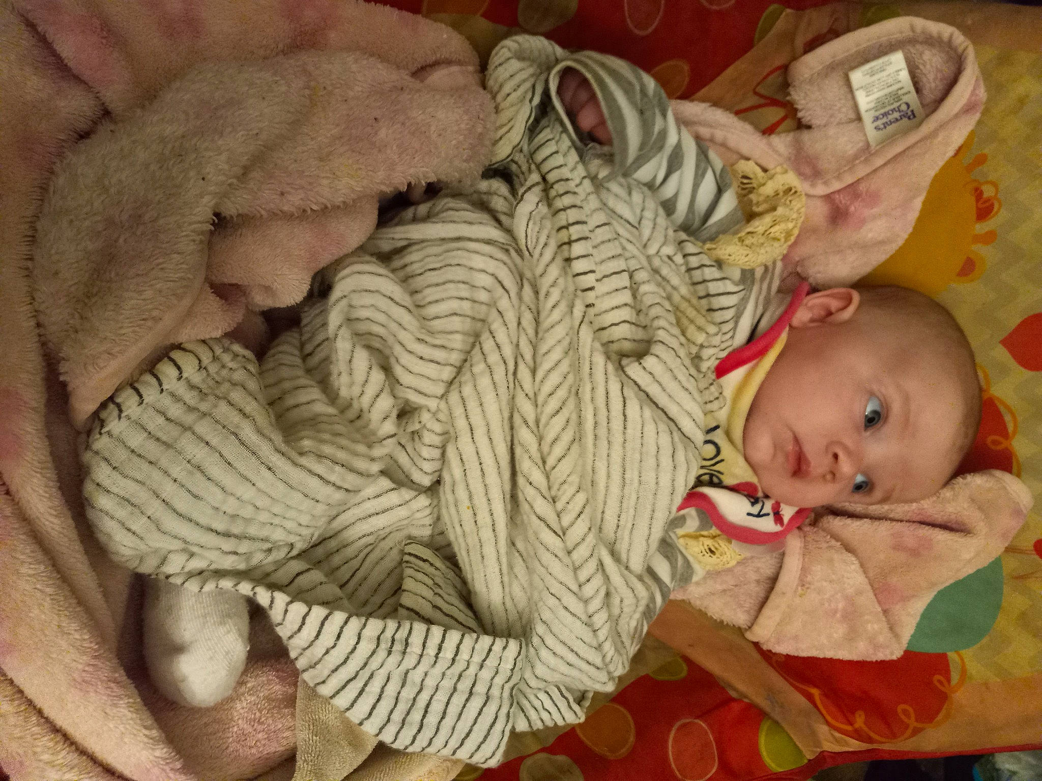 Harmony is registered to the contest to win money with this photo: baby, baby_products, baby_sleeping, baby_toddler_clothing, bedtime, cheek, child, comfort, linens, nap, pattern, person, room, sitting, skin, sleep, textile, toddler, wood, wool