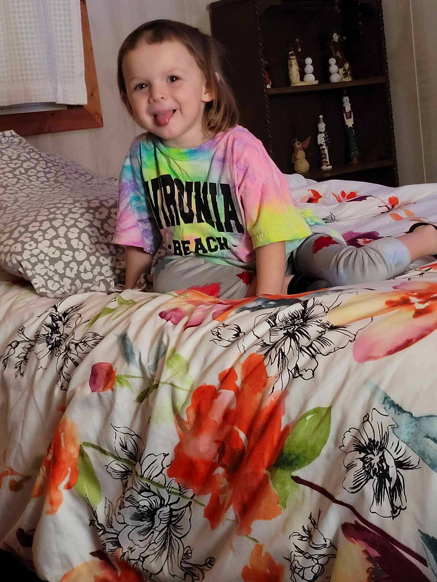 Autumn is registered to the contest to win money with this photo: art, bedding, child, event, face, fun, happy, human_leg, joy, linens, pattern, person, pink, plant, product, room, sleeve, smile, t_shirt, thigh