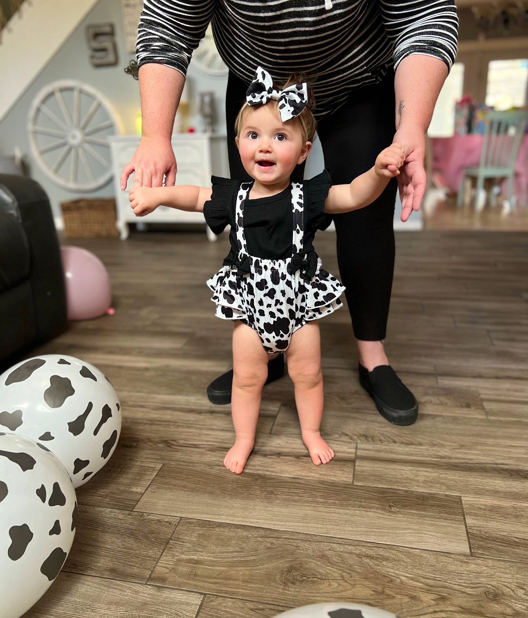 Addyson is registered to the contest to win money with this photo: baby_toddler_clothing, black, dress, entertainment, flooring, fun, gesture, happy, headwear, human_leg, people, performing_arts, person, pink, shoe, sportswear, style, t_shirt, thigh, toddler