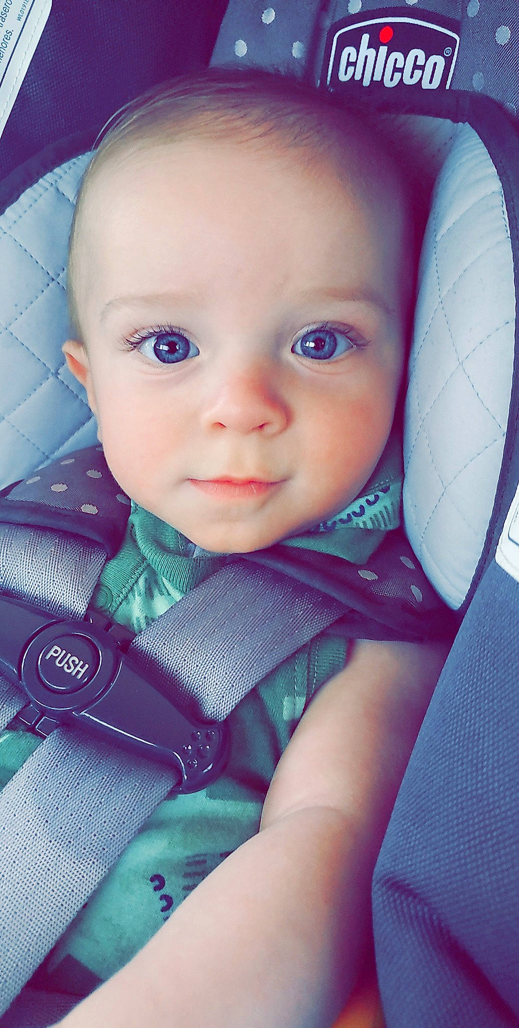 Cain is registered to the contest to win money with this photo: azure, baby, baby_carriage, baby_products, baby_safety, baby_toddler_clothing, blue, car_seat, cheek, child, close_up, comfort, electric_blue, eyebrow, flash_photography, iris, pattern, person, product, skin