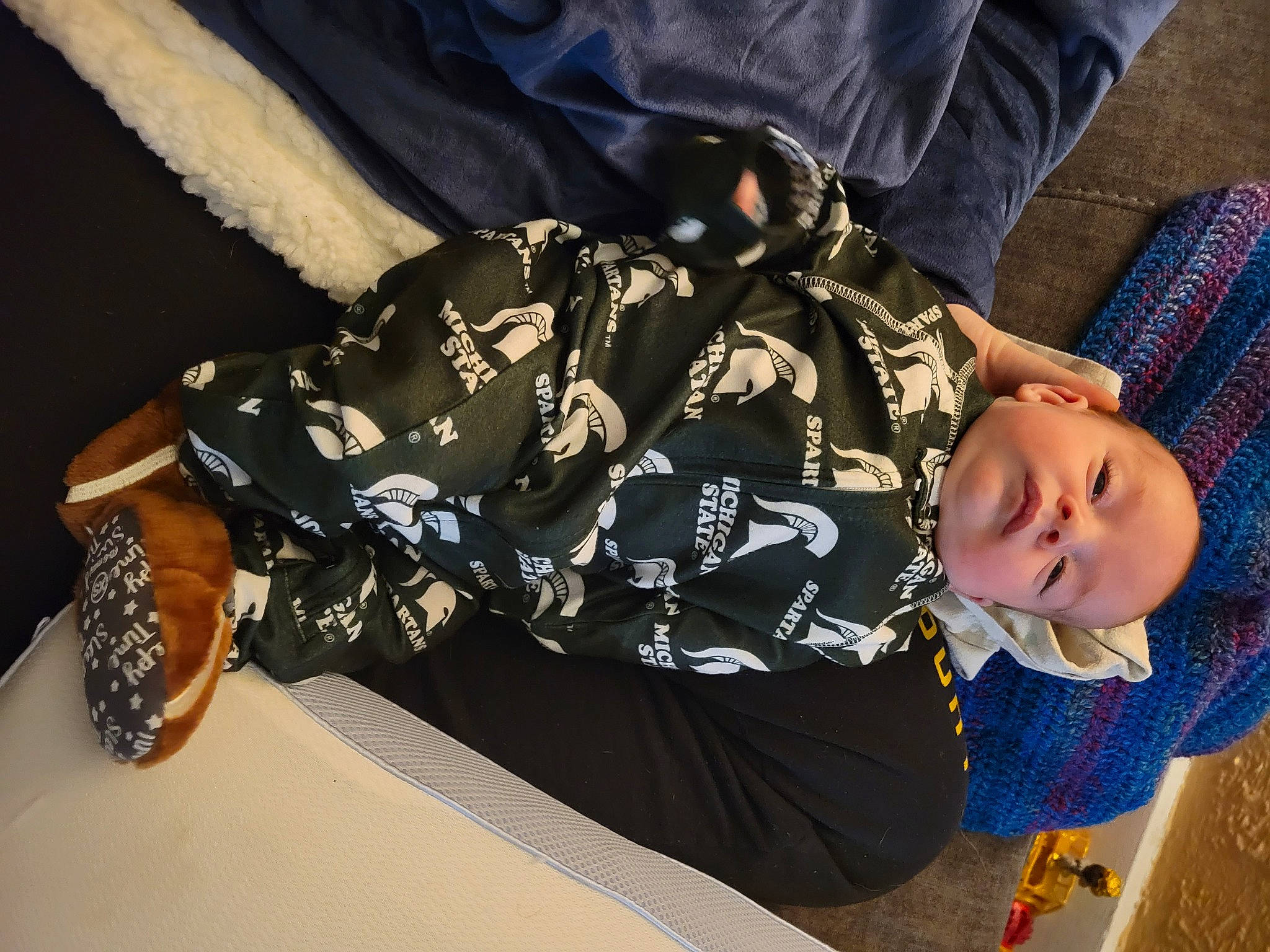 Evander joined the competition — help win amazing prizes! baby_toddler_clothing, child, comfort, denim, elbow, electric_blue, fashion_accessory, gesture, jewellery, pattern, person, sitting, sleeve, t_shirt, thigh, toddler, tree