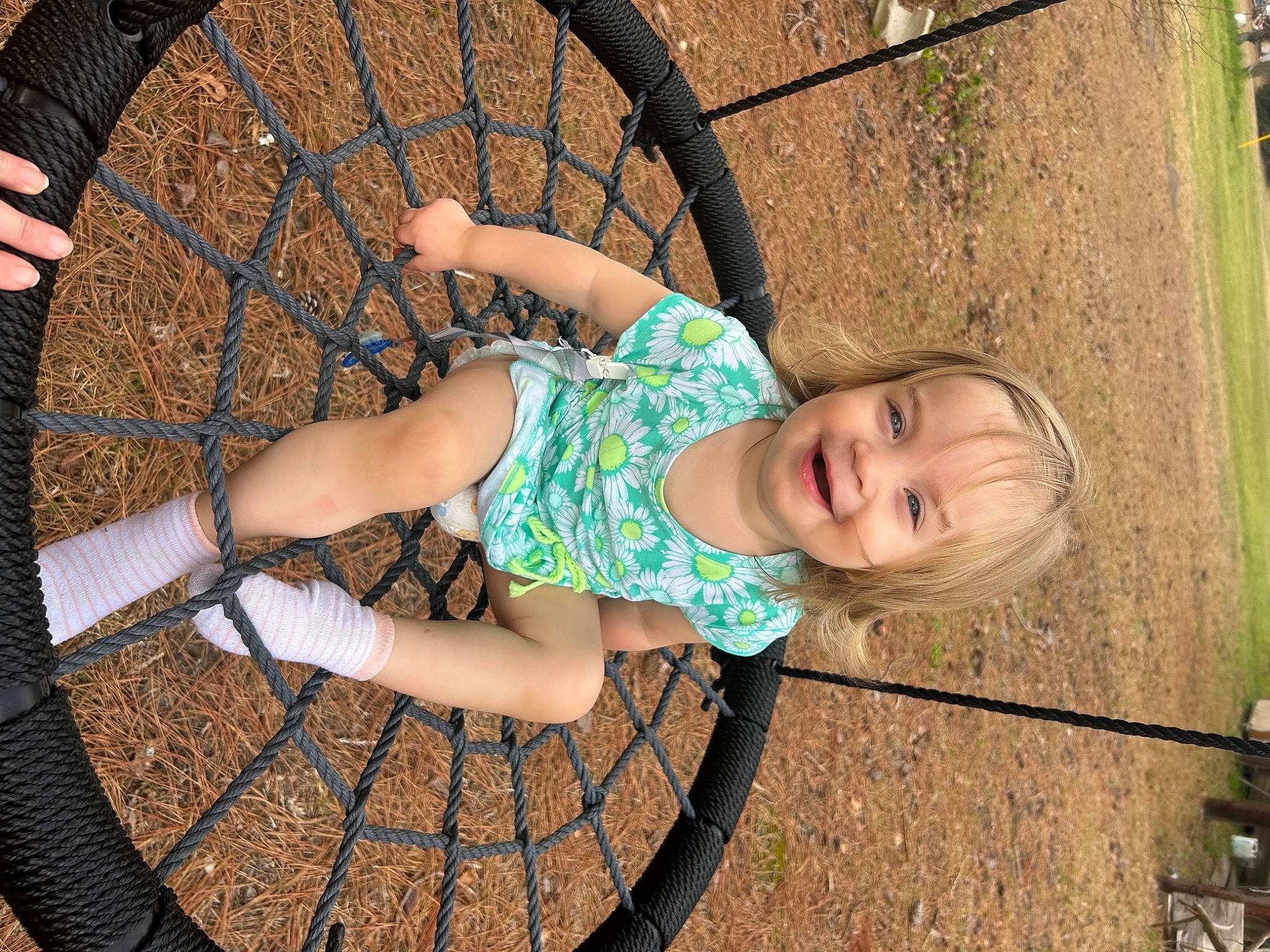 Constance is registered to the contest to win money with this photo: automotive_tire, bicycle_tire, child, cool, fun, grass, hand, happy, joy, leg, leisure, mammal, morning, people_in_nature, person, product, public_space, recreation, tints_and_shades, tire