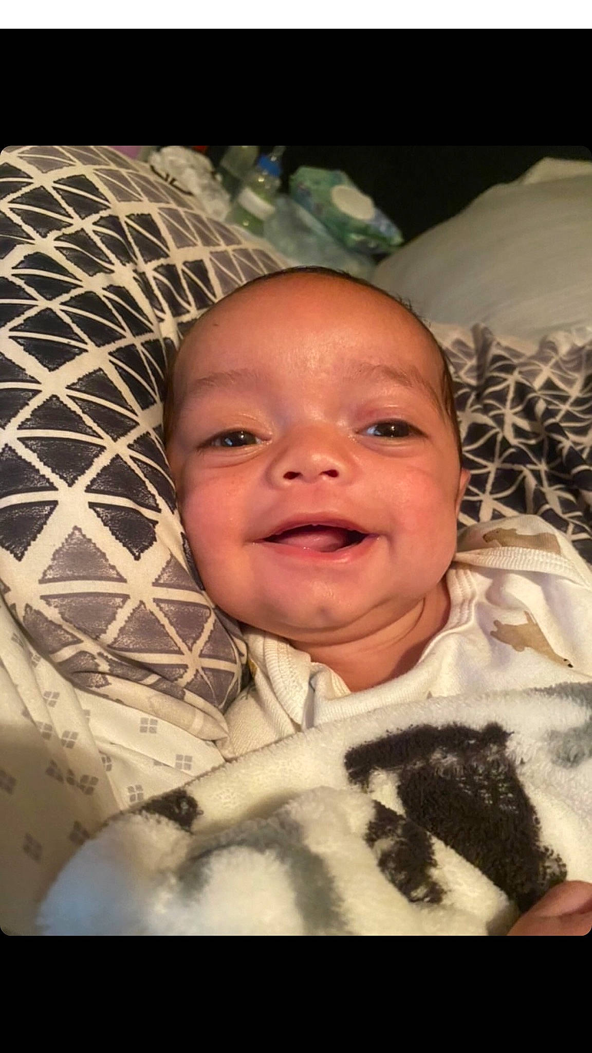 Keyvon is registered to the contest to win money with this photo: baby, baby_laughing, baby_toddler_clothing, cheek, chin, comfort, eye, eyebrow, face, forehead, fun, happy, head, headgear, iris, mouth, nose, person, skin, smile