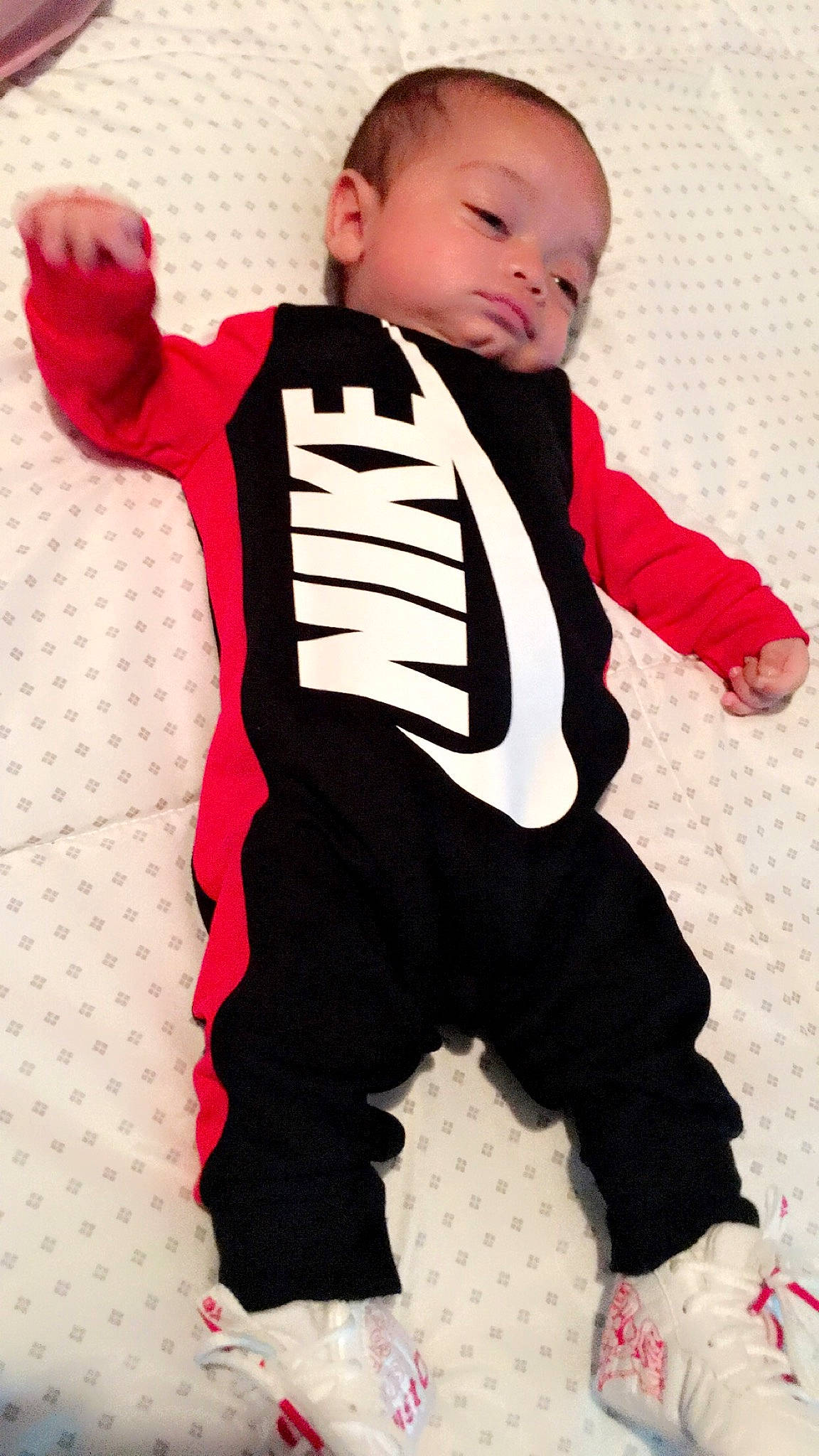 Keyvon joined the competition — help win amazing prizes! baby, baby_products, baby_toddler_clothing, carmine, child, collar, fur, gesture, happy, magenta, outerwear, pattern, person, personal_protective_equipment, pink, red, sleeve, t_shirt, textile, thumb