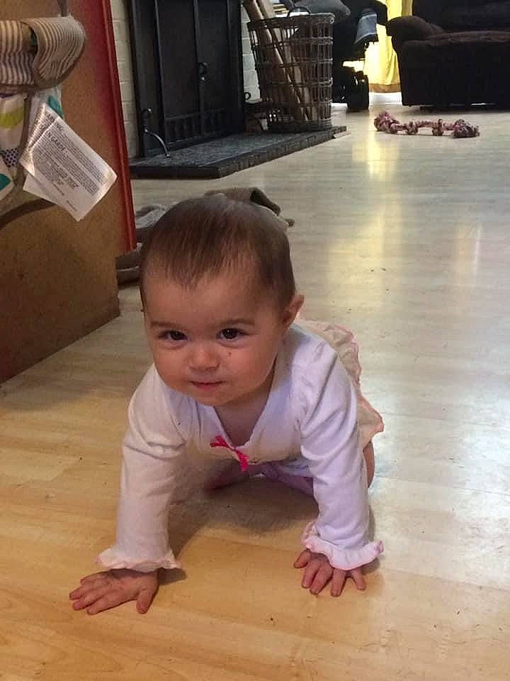 Harper is registered to the contest to win money with this photo: baby, child, crawling, floor, flooring, hardwood, person, play, sitting, toddler, wood, wood_flooring