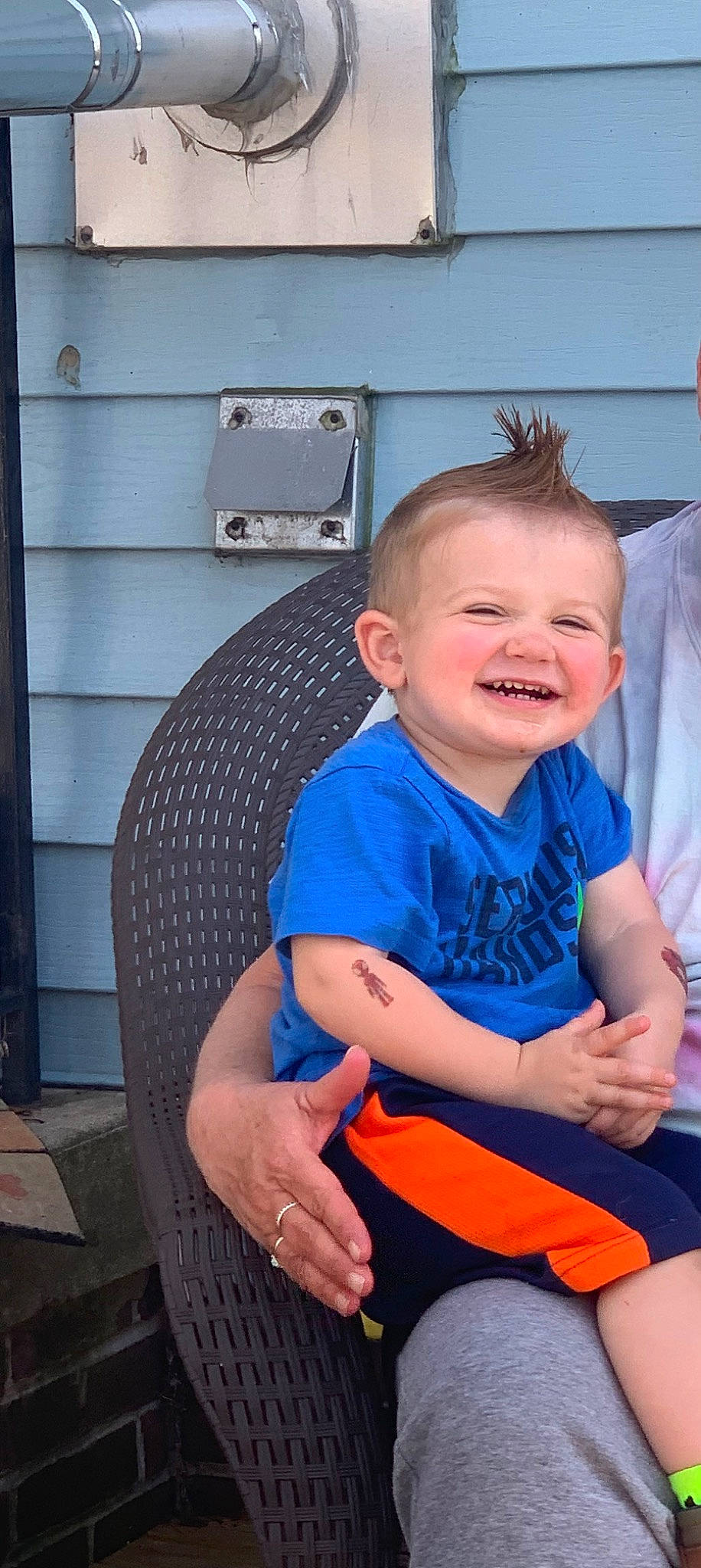 Camden is registered to the contest to win money with this photo: baby, baby_toddler_clothing, chair, child, electric_blue, event, eye, fun, happy, joy, lap, leg, person, room, shorts, sitting, smile, standing, t_shirt, thigh