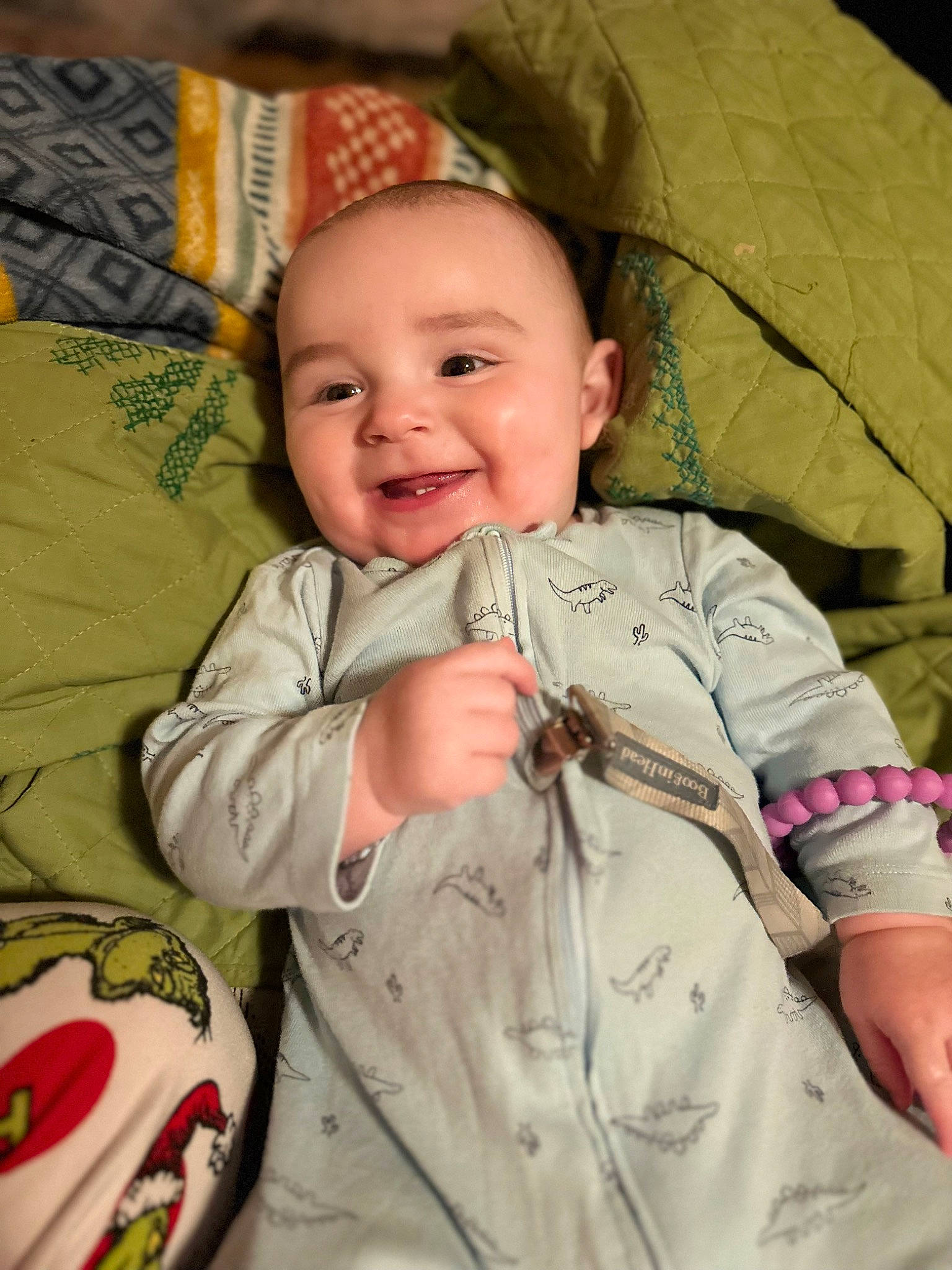 Everett is registered to the contest to win money with this photo: baby, baby_toddler_clothing, cheek, child, comfort, face, facial_expression, gesture, hairstyle, happy, jacket, joy, mouth, nose, outerwear, person, product, skin, sleeve, smile