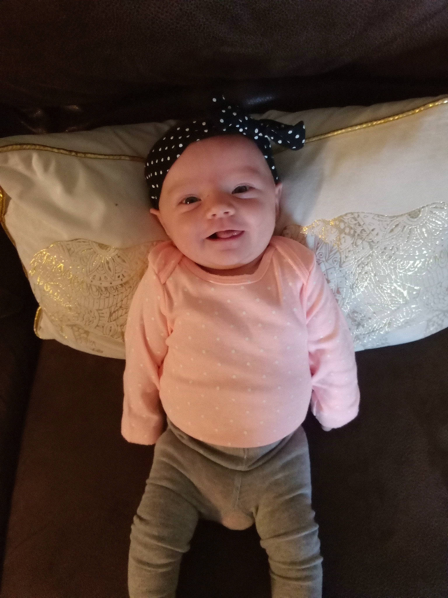 Makenzie is registered to the contest to win money with this photo: baby, baby_toddler_clothing, cheek, chin, clothing, eye, eyebrow, face, flash_photography, happy, head, headwear, human_body, iris, lip, neck, nose, person, skin, sleeve