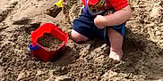 Jayden is registered to the contest to win money with this photo: beach, child, fun, material, mud, outdoor_play_equipment, play, playground, recreation, sand, sandpit, soil, toddler, vacation
