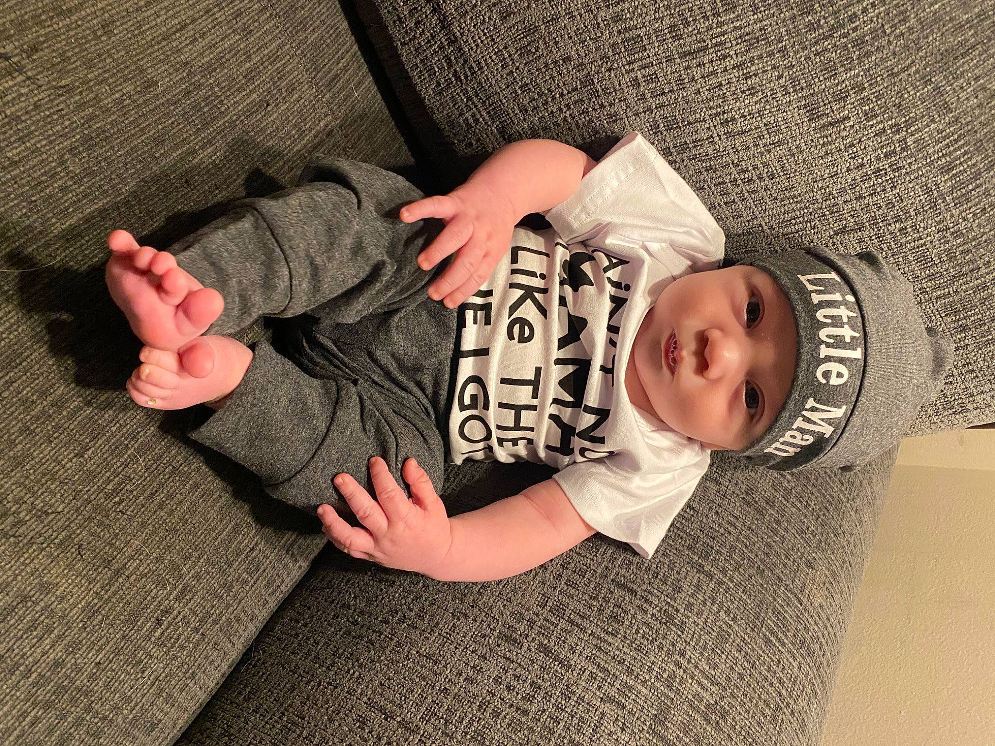 Ricky joined the competition — help win amazing prizes! baby, baby_sleeping, baby_toddler_clothing, child, comfort, finger, flooring, foot, gesture, hand, headwear, human_body, human_leg, pattern, person, sitting, skin, sleeve, thumb, toddler