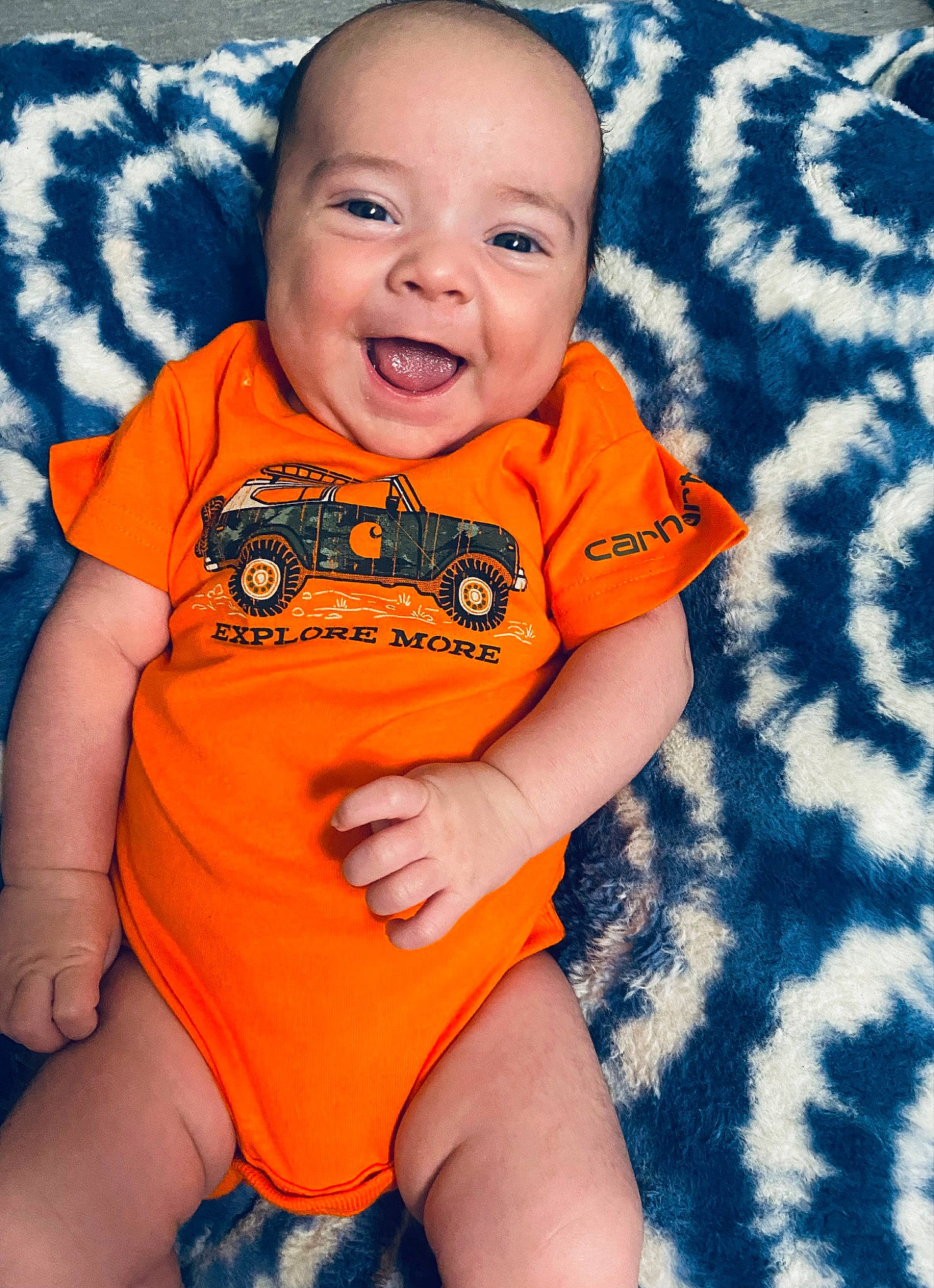 Rayden joined the competition — help win amazing prizes! baby, baby_toddler_clothing, cheek, clothing, eye, face, facial_expression, finger, happy, head, human_body, muscle, orange, organ, person, skin, sleeve, smile, stomach, t_shirt