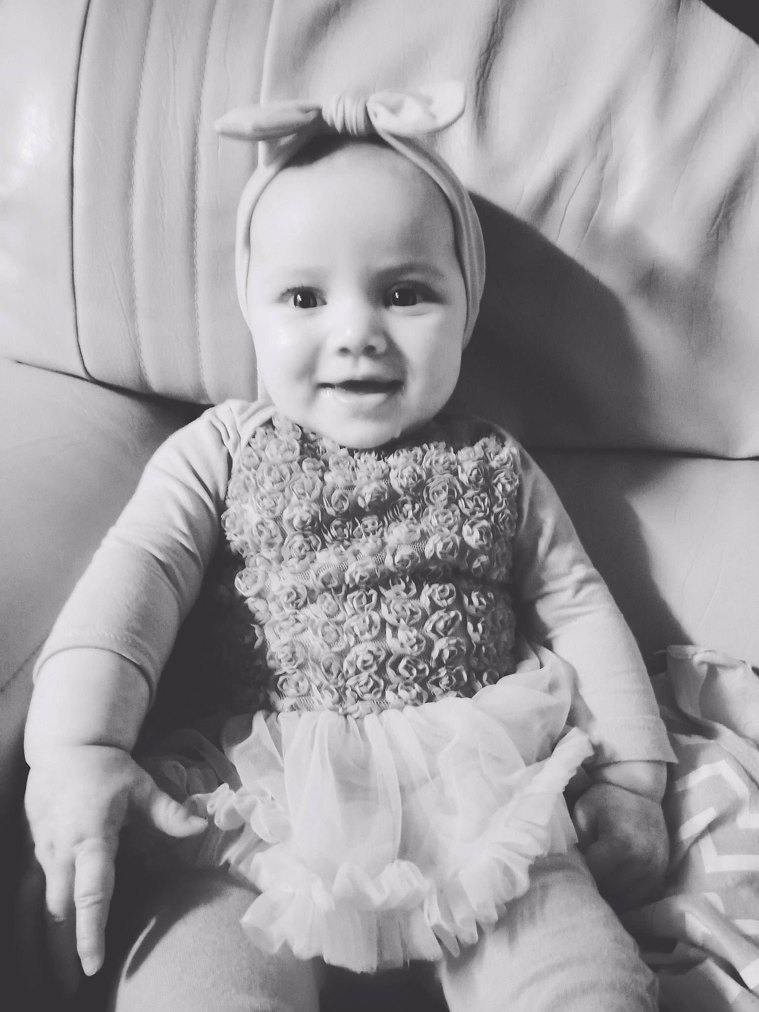 Mahlani joined the competition — help win amazing prizes! baby, black_and_white, child, dress, face, facial_expression, iris, monochrome, monochrome_photography, pattern, people, person, photograph, photography, portrait, sitting, smile, snapshot, stock_photography, toddler