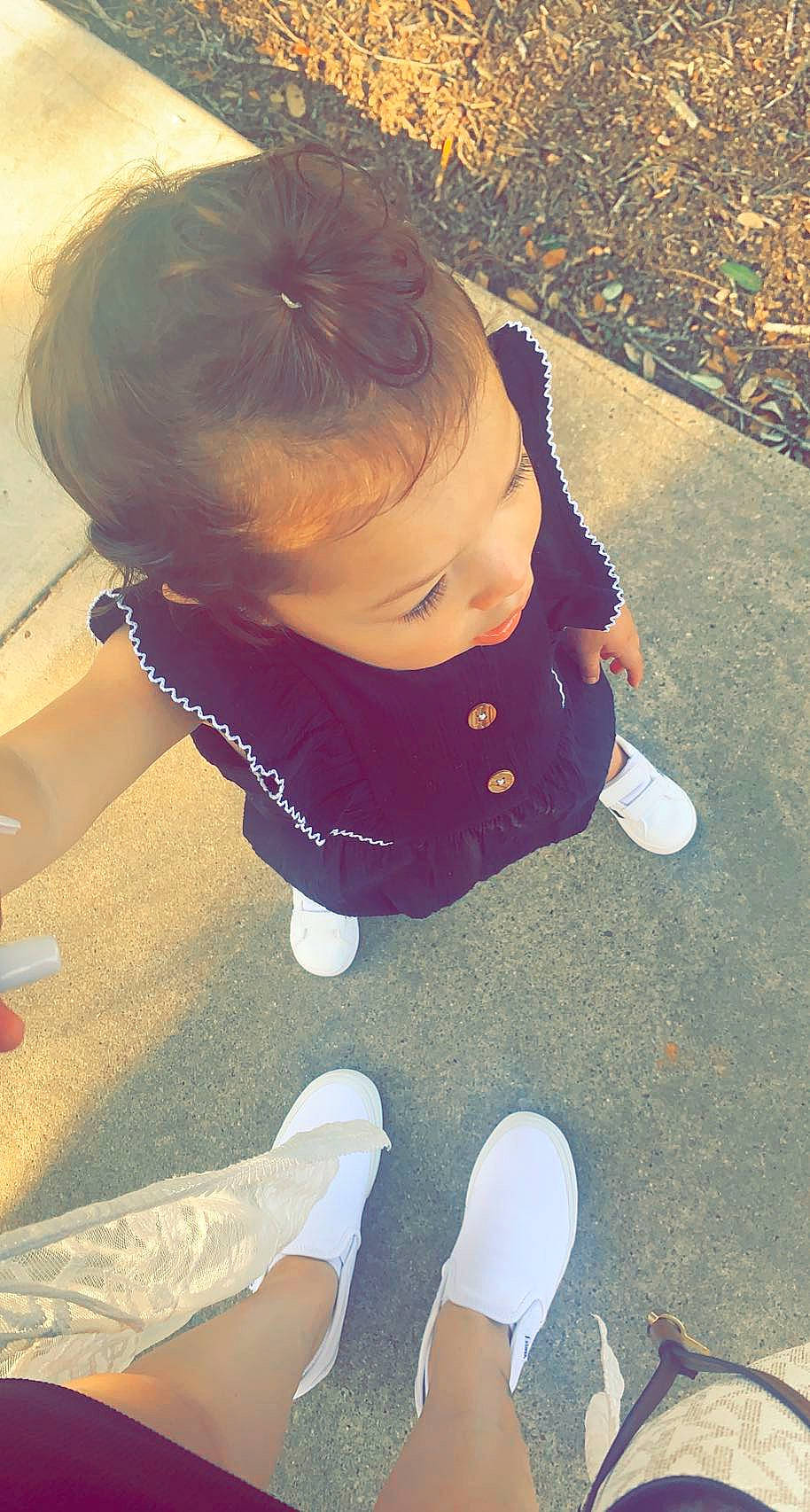 Aileen is registered to the contest to win money with this photo: baby, baby_toddler_clothing, child, cool, electric_blue, floor, flooring, foot, fun, grass, hair, happy, human_leg, knee, nose, person, snapshot, sock, thigh, toddler