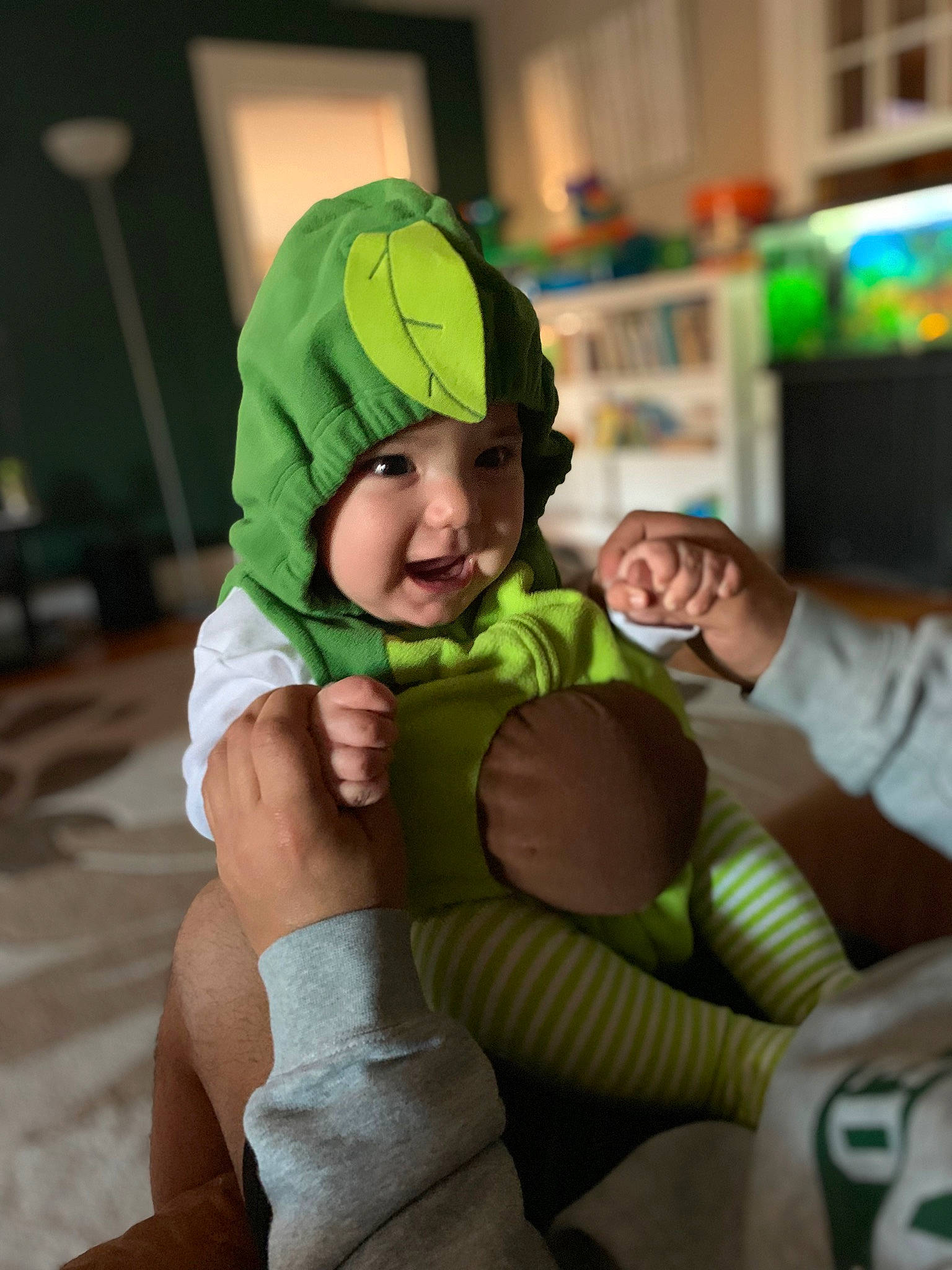 Artemus is registered to the contest to win money with this photo: animation, baby, baby_products, baseball_cap, cap, child, comfort, event, fun, glove, happy, headwear, hoodie, leisure, person, personal_protective_equipment, recreation, room, smile, t_shirt
