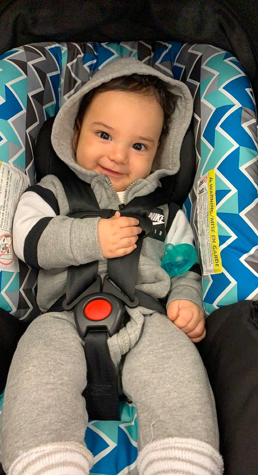 Artemus is registered to the contest to win money with this photo: auto_part, baby, baby_carriage, baby_in_car_seat, baby_products, baby_safety, baby_toddler_clothing, car_seat, cheek, child, comfort, eye, face, finger, fun, head, joy, person, product, seat_belt