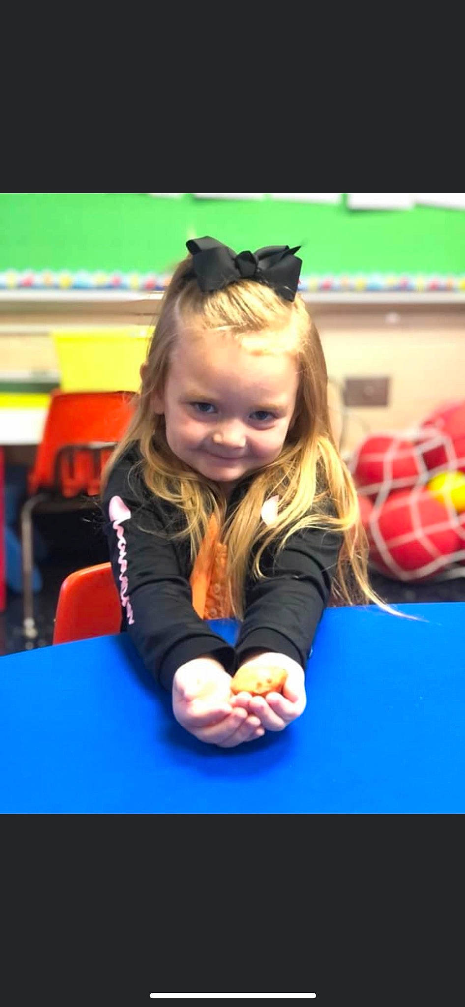 Paisley joined the competition — help win amazing prizes! chair, child, electric_blue, flooring, fun, happy, indoor_games_and_sports, jacket, joy, leisure, person, plaid, play, recreation, room, sitting, smile, standing, table, tartan