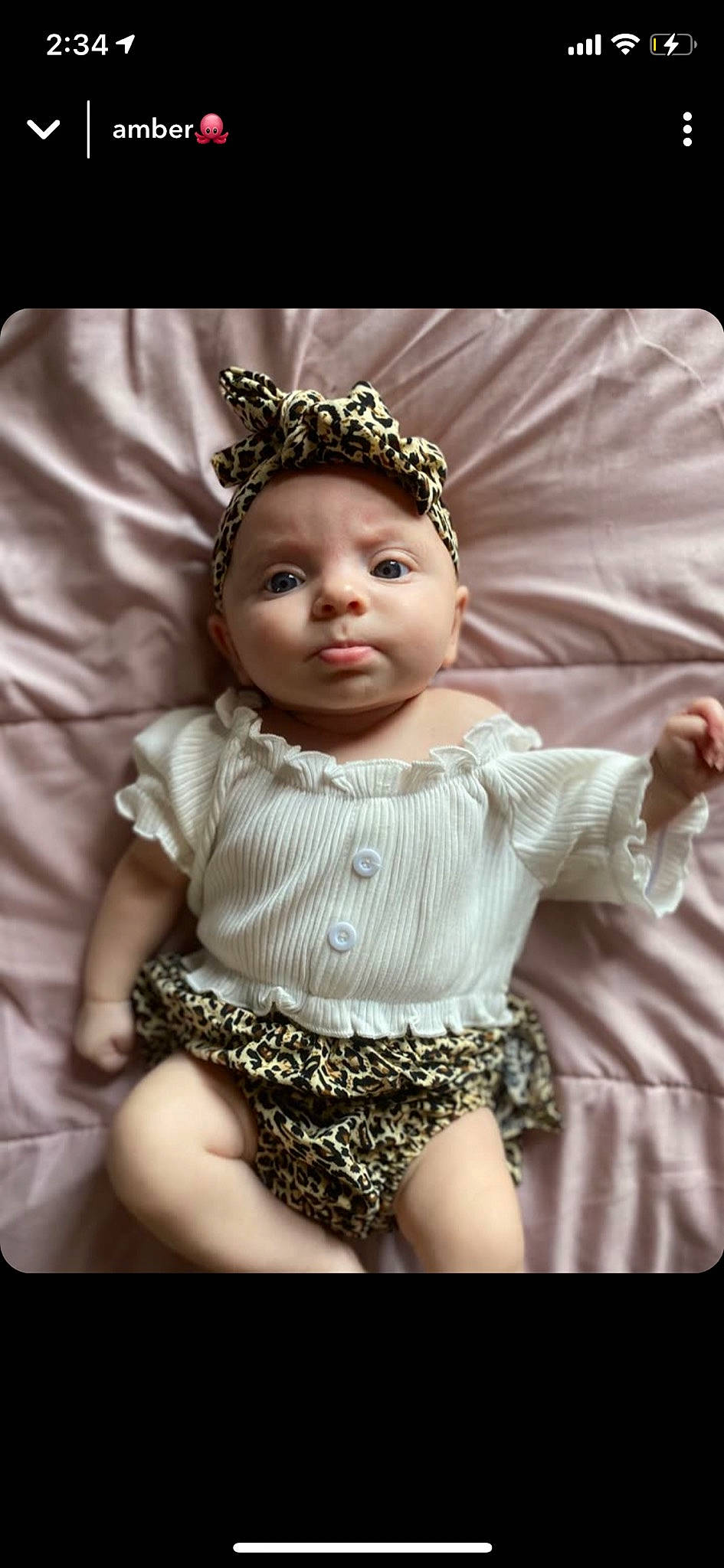 Ayvah is registered to the contest to win money with this photo: baby, baby_toddler_clothing, chin, dress, embellishment, eyelash, face, fashion_design, fawn, flash_photography, happy, head, headgear, headpiece, human_body, iris, necklace, person, pink, sleeve