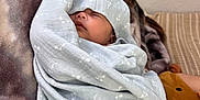 Anaiah is registered to the contest to win money with this photo: baby, blanket, sleeping, cozy, soft, fabric, wrapped, infant, peaceful, rest, child, bed, comfort, indoor, portrait, cute, head, face, toddler, warm