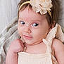 Rylenn is registered to the contest to win money with this photo: accessories, baby, bodypart, clothing, dress, face, finger, flower, flowerarrangement, flowerbouquet, hand, happy, head, headband, newborn, person, photography, plant, portrait, smile