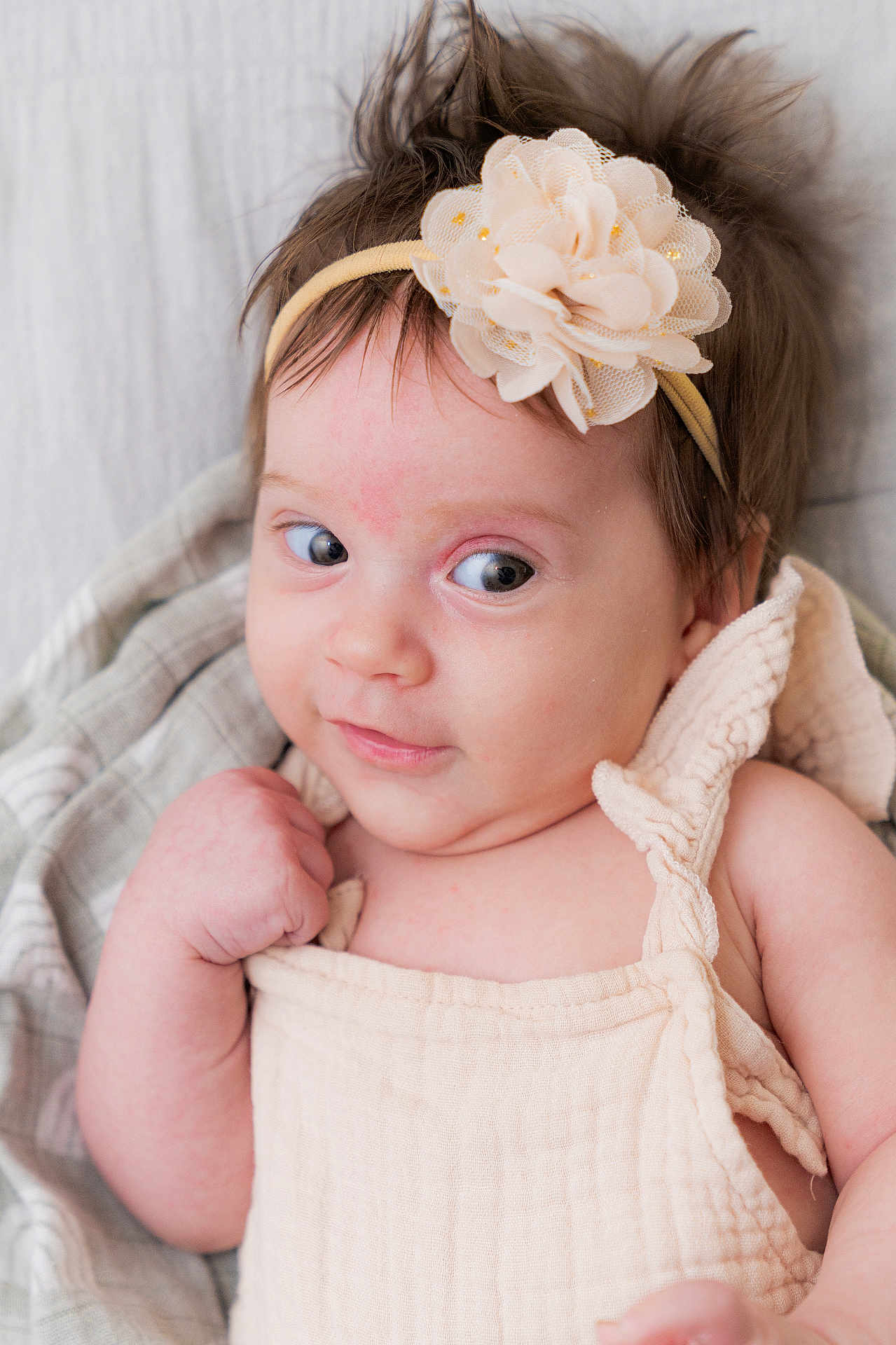 Rylenn is registered to the contest to win money with this photo: accessories, baby, bodypart, clothing, dress, face, finger, flower, flowerarrangement, flowerbouquet, hand, happy, head, headband, newborn, person, photography, plant, portrait, smile