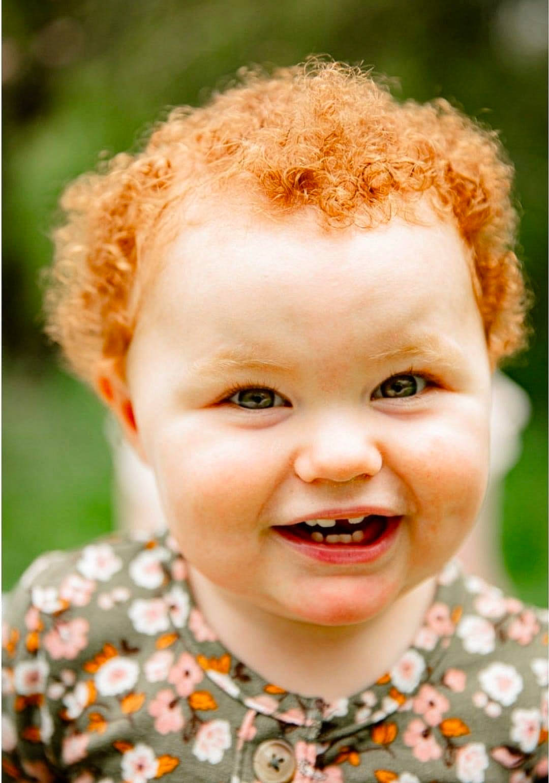 Makenzie is registered to the contest to win money with this photo: cheek, collar, dress_shirt, face, gesture, grass, happy, head, iris, joy, lip, nose, people_in_nature, person, photograph, plant, skin, sleeve, smile, summer