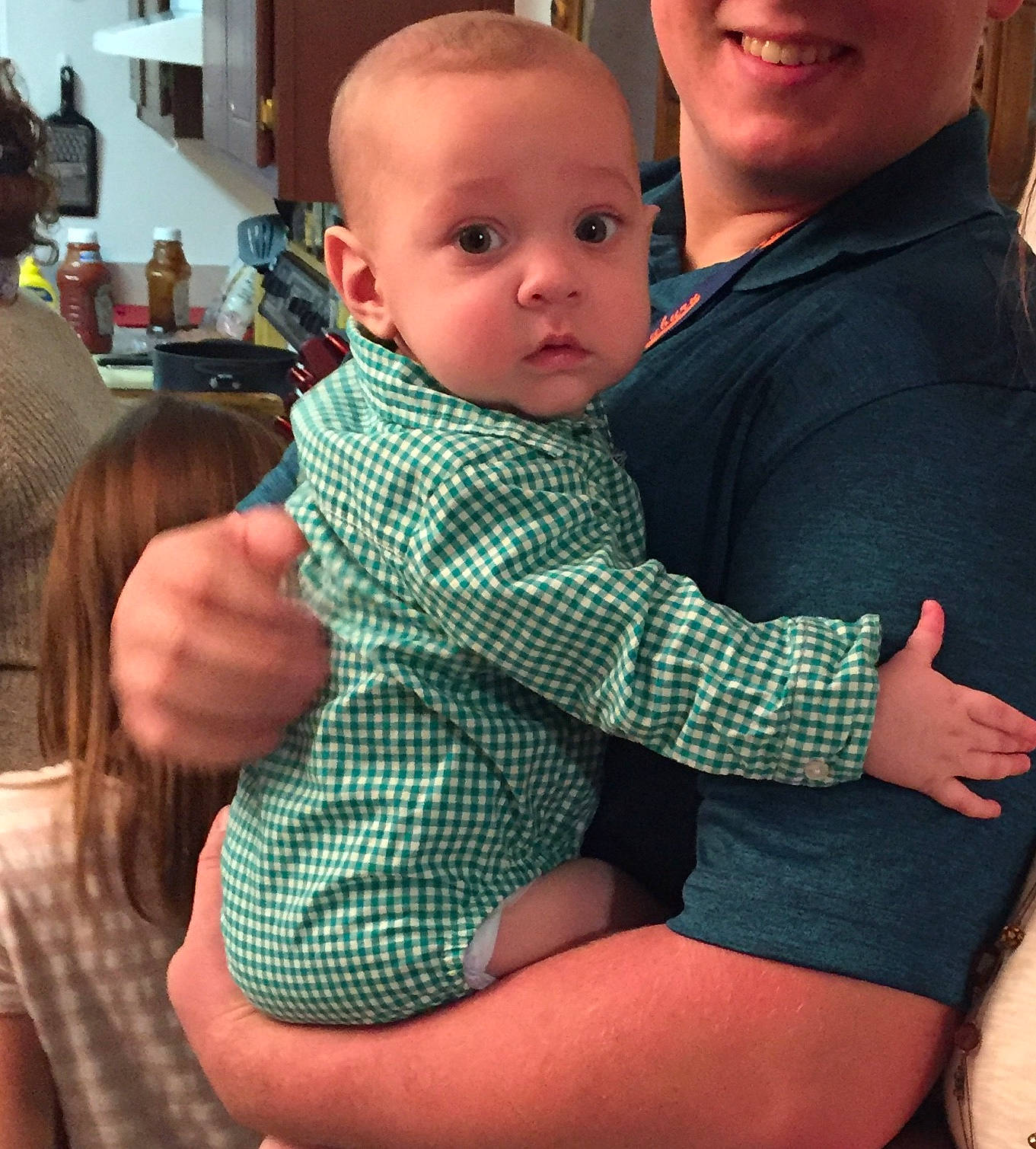 Keenan is registered to the contest to win money with this photo: abdomen, arm, cheek, child, day, finger, fun, girl, hand, infant, leg, mother, mouth, neck, person, product, sitting, skin, toddler, trunk