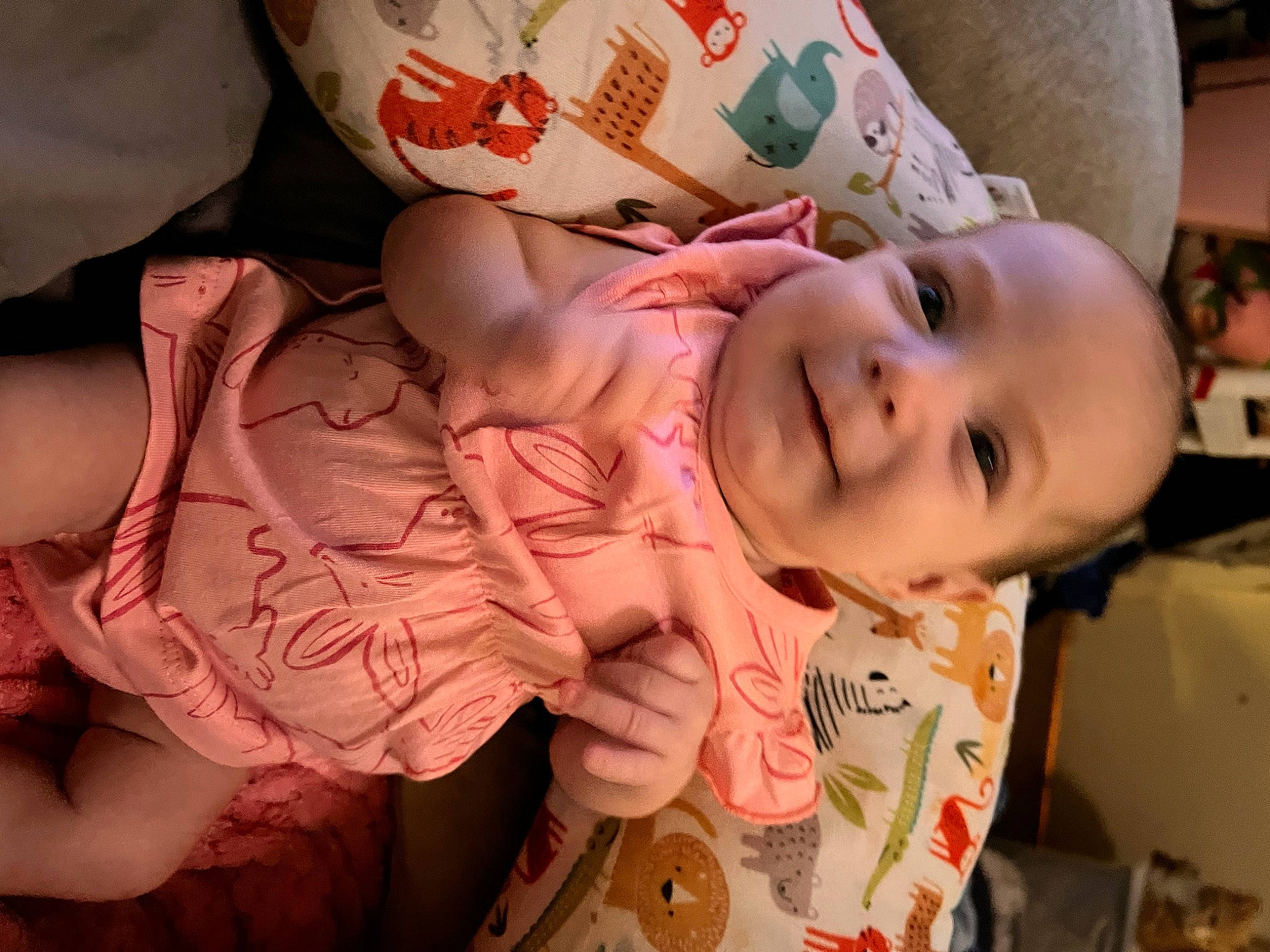 Amora is registered to the contest to win money with this photo: baby, baby_toddler_clothing, cheek, child, eye, facial_expression, fun, happy, head, human_body, joy, lip, mouth, nose, person, pink, skin, sleeve, smile, textile