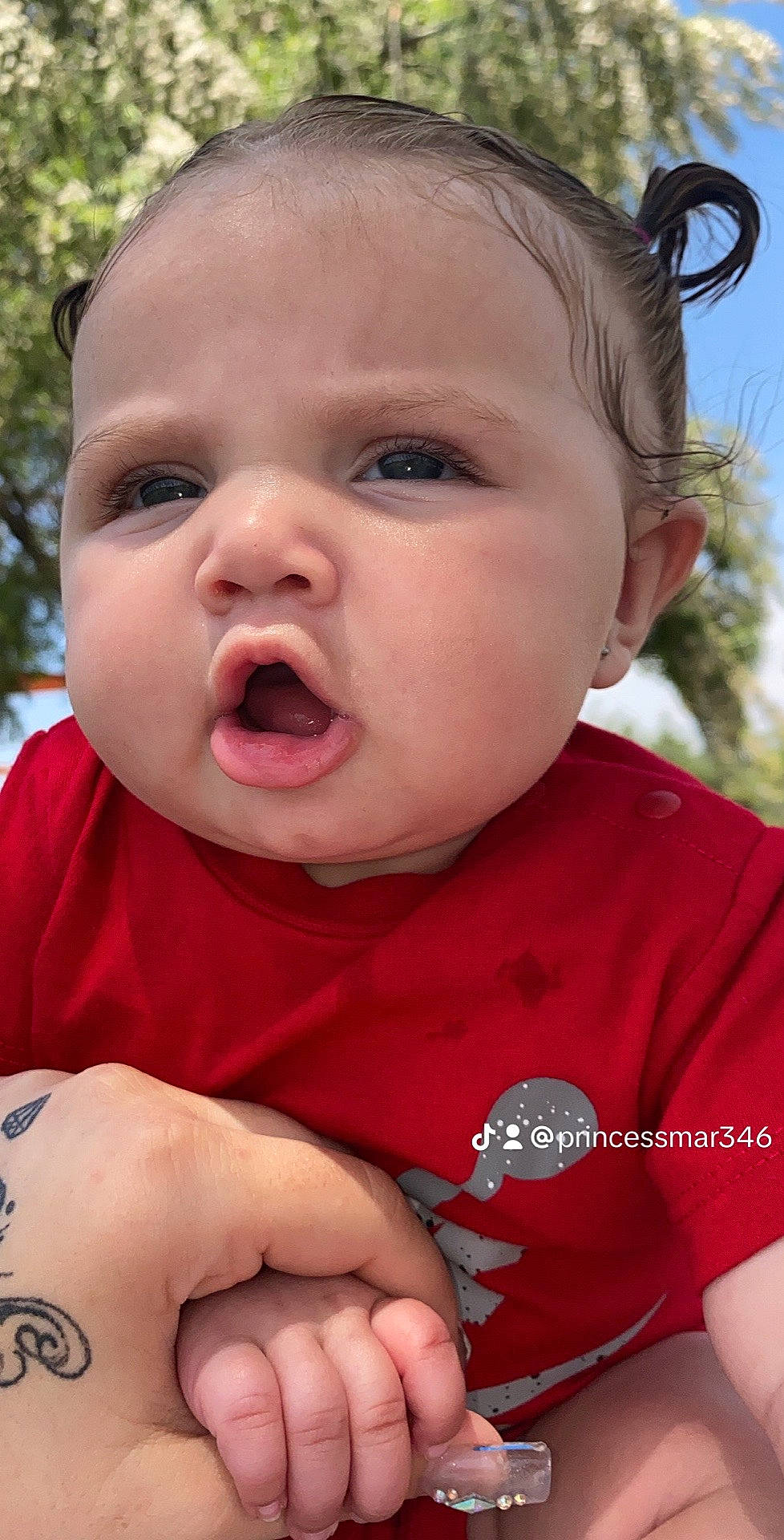 Ariyah joined the competition — help win amazing prizes! baby, baby_toddler_clothing, cheek, chin, eyelash, facial_expression, finger, gesture, grass, happy, human, iris, lip, mammal, mouth, nose, organ, person, pink, skin