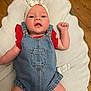 Lily a rejoint le concours — aidez-le/la à gagner de superbes lots ! baby, denim, romper, headband, cushion, floor, wooden_floor, infant, clothing, person, child, cute, indoors, young, skin, face, arm, legs, comfortable, textile
