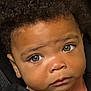 Kamaya joined the competition — help win amazing prizes! baby, child, face, eyes, curly_hair, portrait, close_up, car_seat, infant, skin, expression, clothing, young, person, cute, looking, head, indoors, seatbelt, human