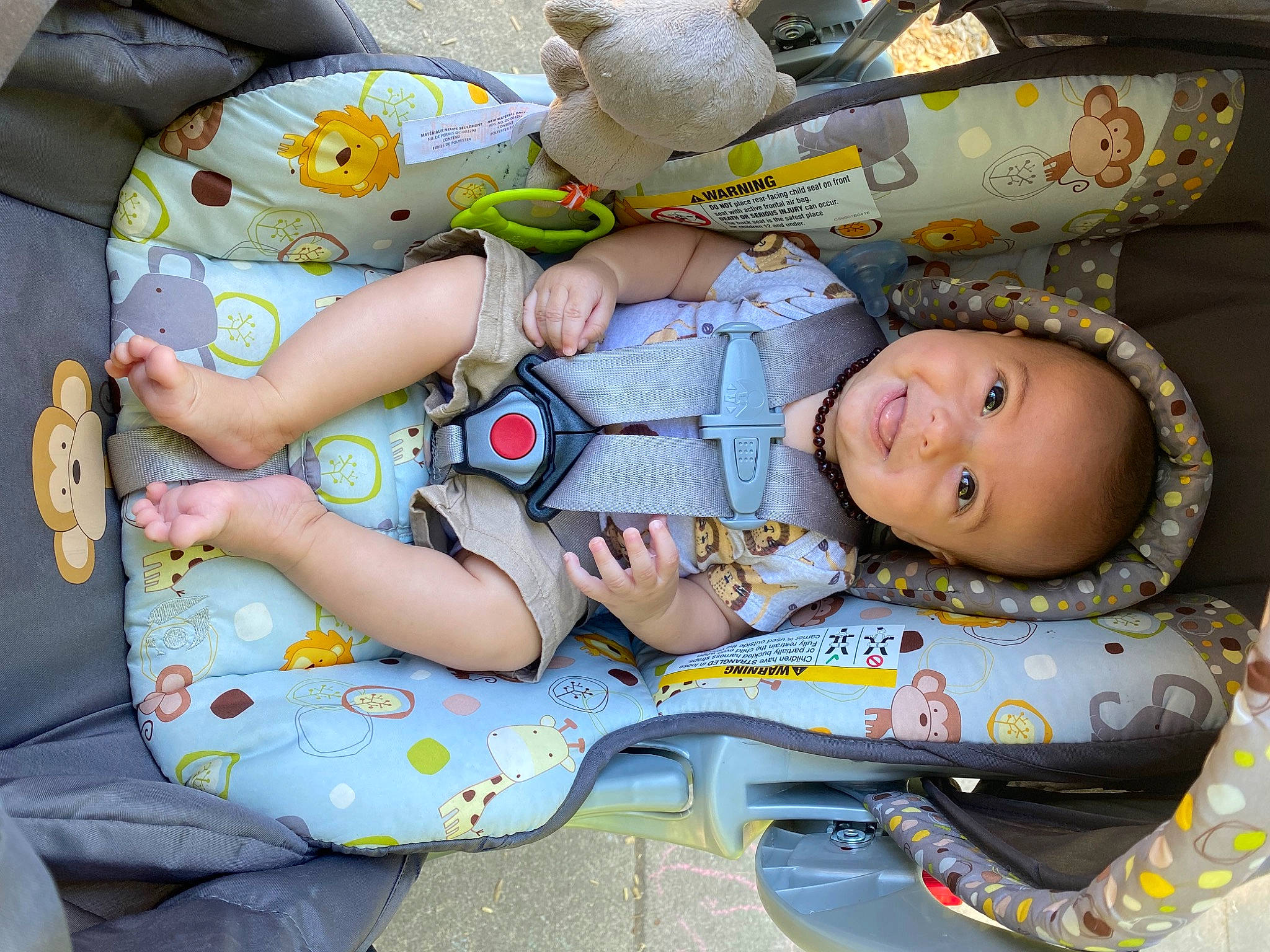 Mathias is registered to the contest to win money with this photo: auto_part, baby, baby_carriage, baby_in_car_seat, baby_products, baby_sleeping, baby_toddler_clothing, bag, car_seat, child, comfort, fun, joy, lap, linens, pattern, person, personal_protective_equipment, sitting, smile