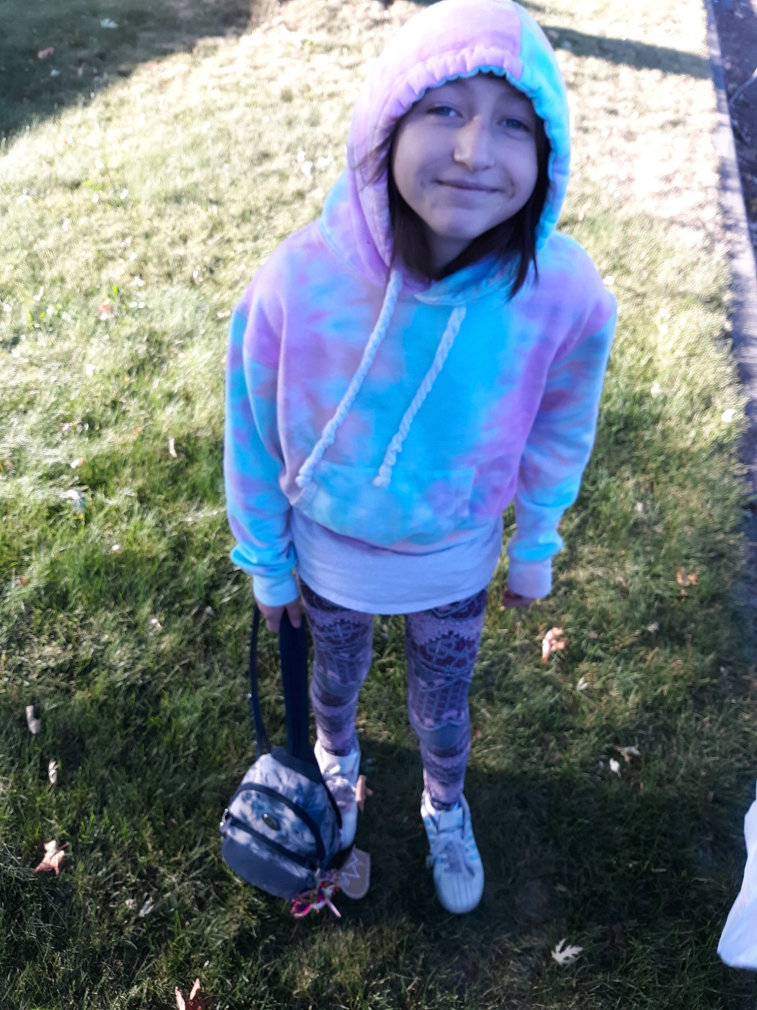 Alison joined the competition — help win amazing prizes! cool, electric_blue, fun, grass, headwear, hood, hoodie, jacket, joy, outerwear, person, purple, smile