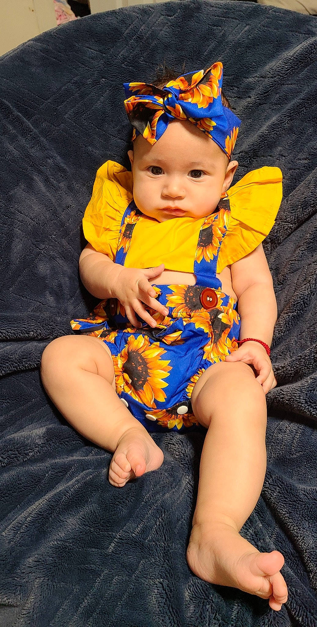 Linda is registered to the contest to win money with this photo: baby, baby_toddler_clothing, beauty, blue, chair, child, dress, electric_blue, eye, face, flash_photography, fun, happy, head, headwear, human, people, person, purple, skin