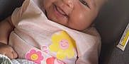 Nevaeh Jade is registered to the contest to win money with this photo: baby, smiling, child, car_seat, blanket, clothing, cute, face, infant, person, happy, indoors, closeup, head, seat, toddler, pattern, fabric, comfort, joy