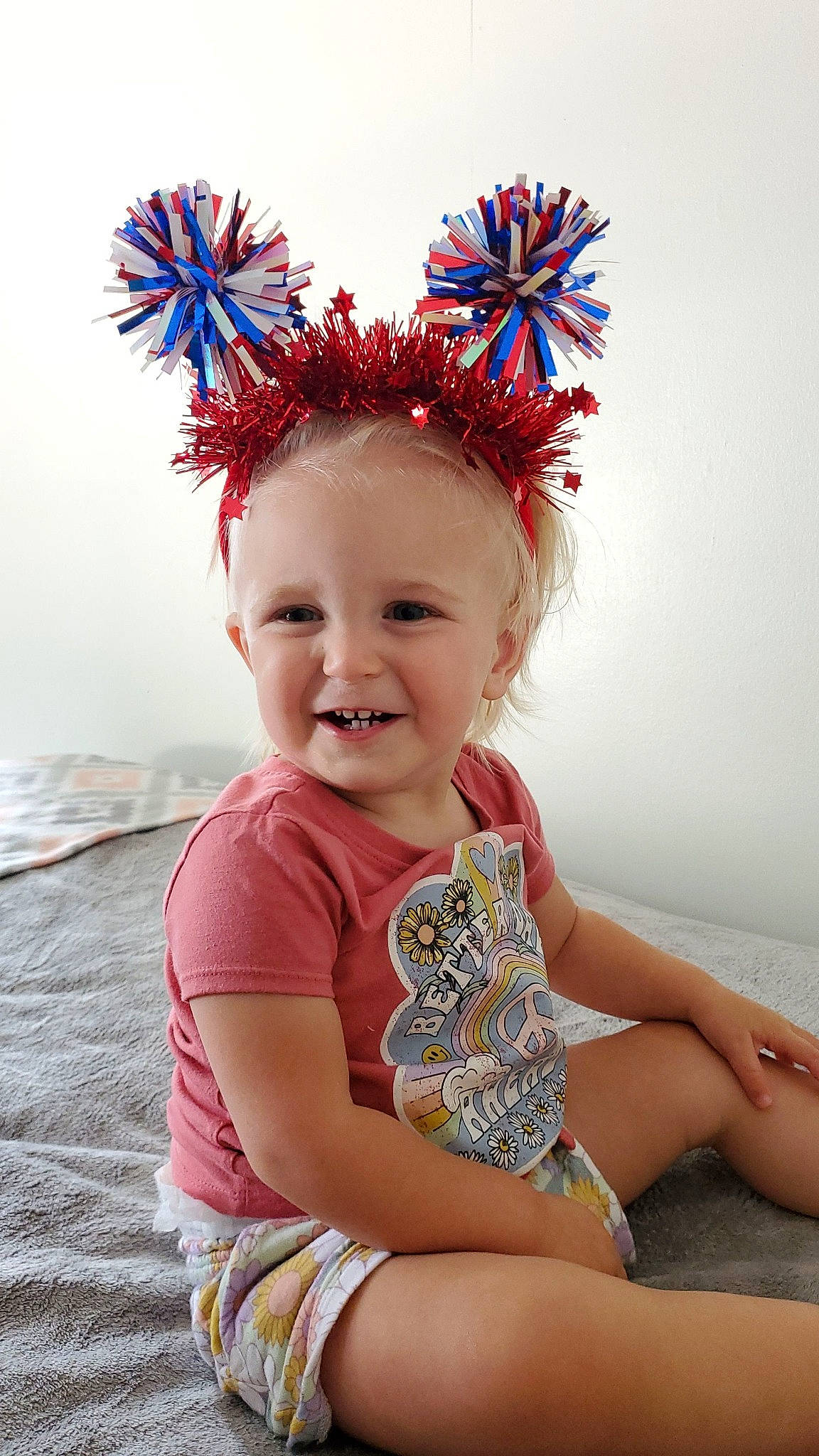 Luella joined the competition — help win amazing prizes! baby, baby_toddler_clothing, cap, child, costume_hat, eye, face, facial_expression, fun, happy, headband, headgear, headpiece, joy, pattern, person, pink, red, sleeve, smile